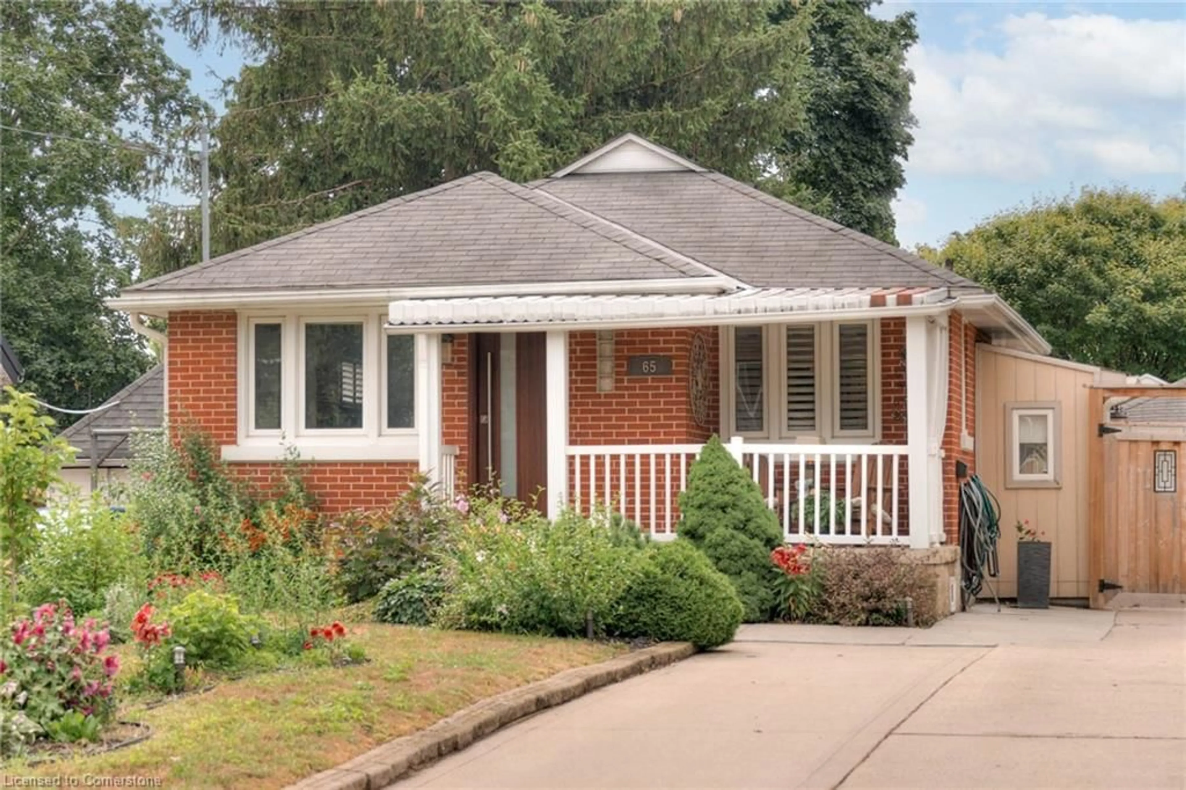 Home with brick exterior material, street for 65 Belleview Ave, Kitchener Ontario N2B 1G4
