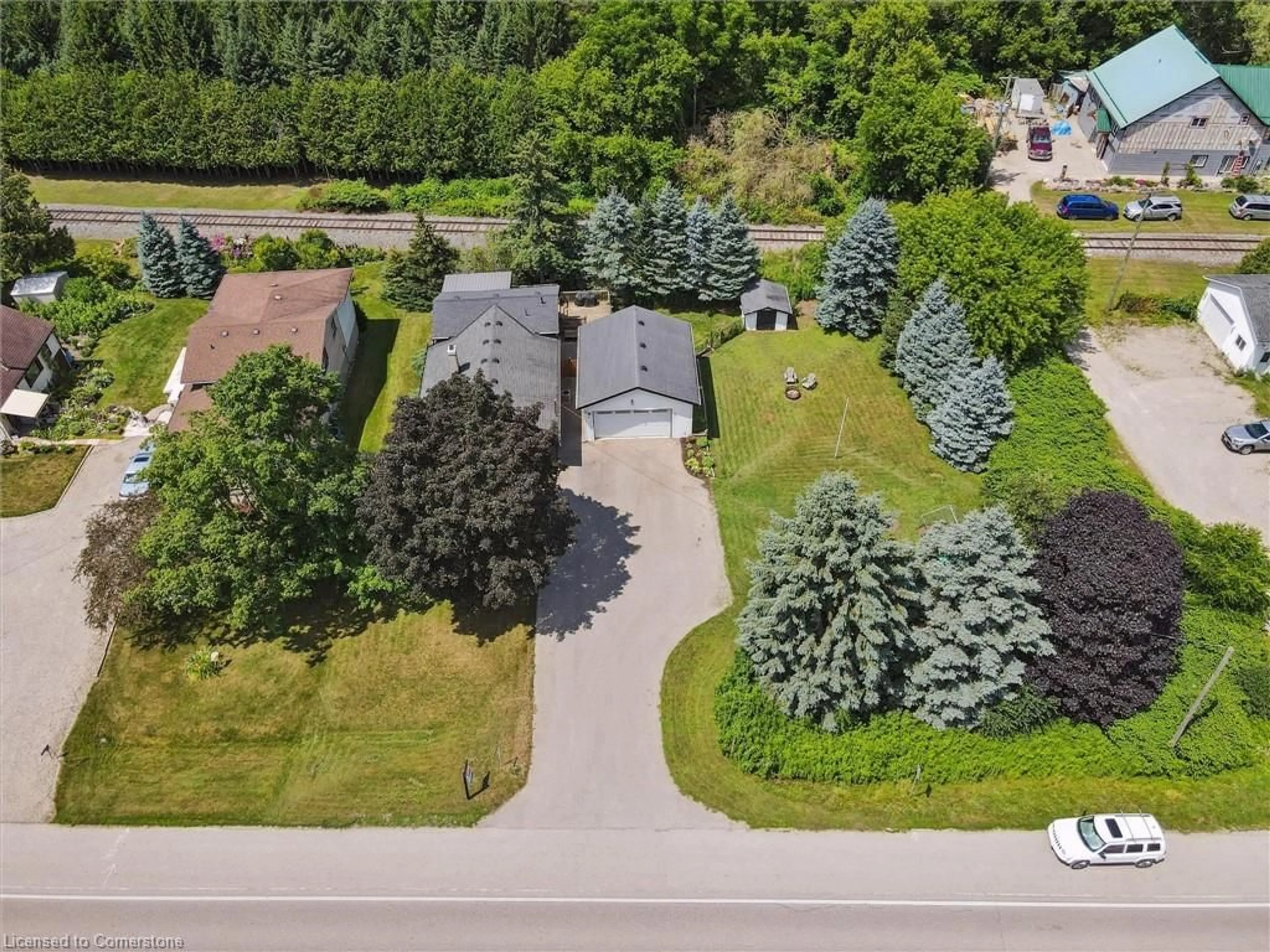 A pic from outside/outdoor area/front of a property/back of a property/a pic from drone, street for 585033 County Rd 9 Rd, Woodstock Ontario N4S 7V6