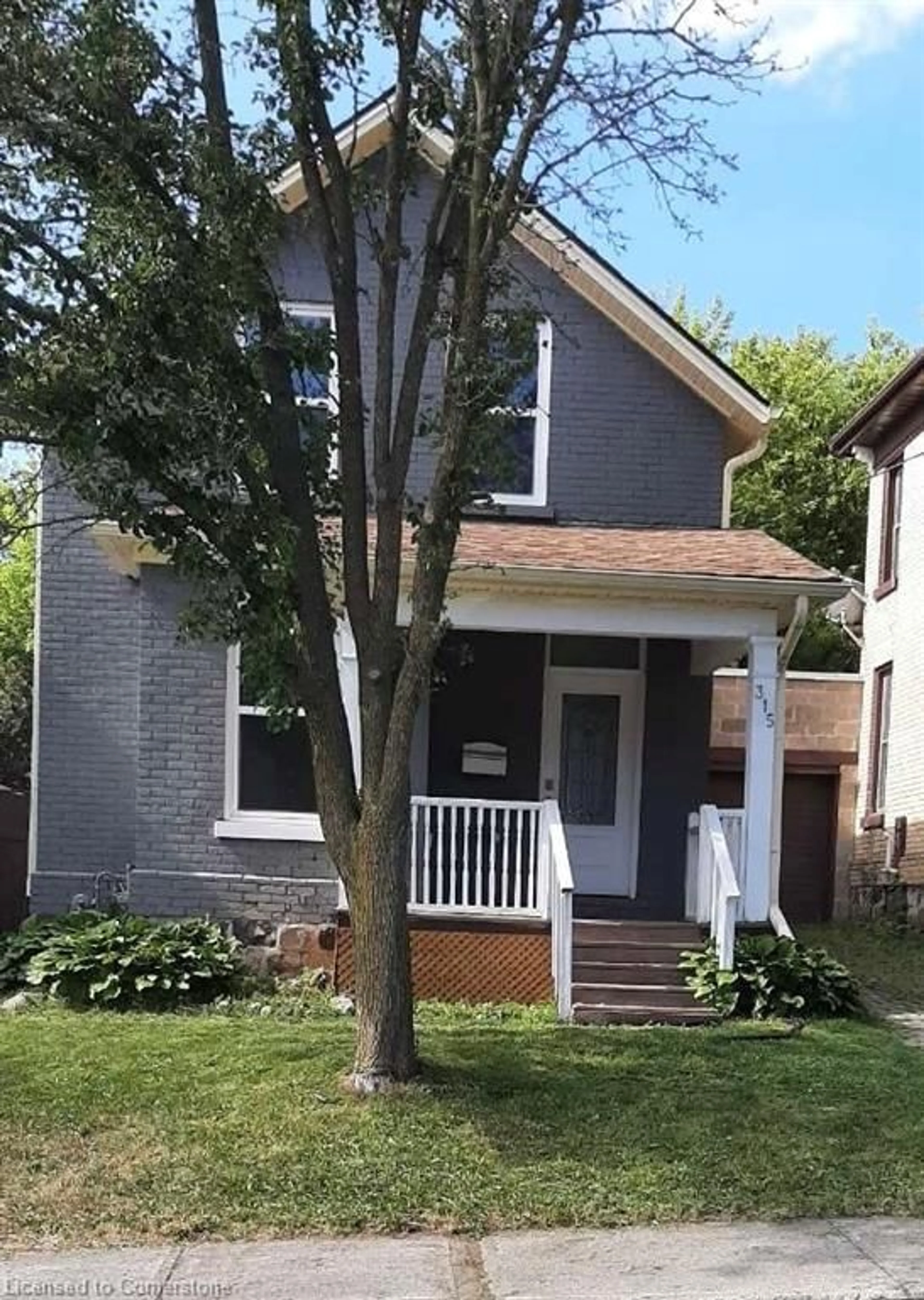 Home with vinyl exterior material, street for 315 Simcoe St, Woodstock Ontario N4S 1J2
