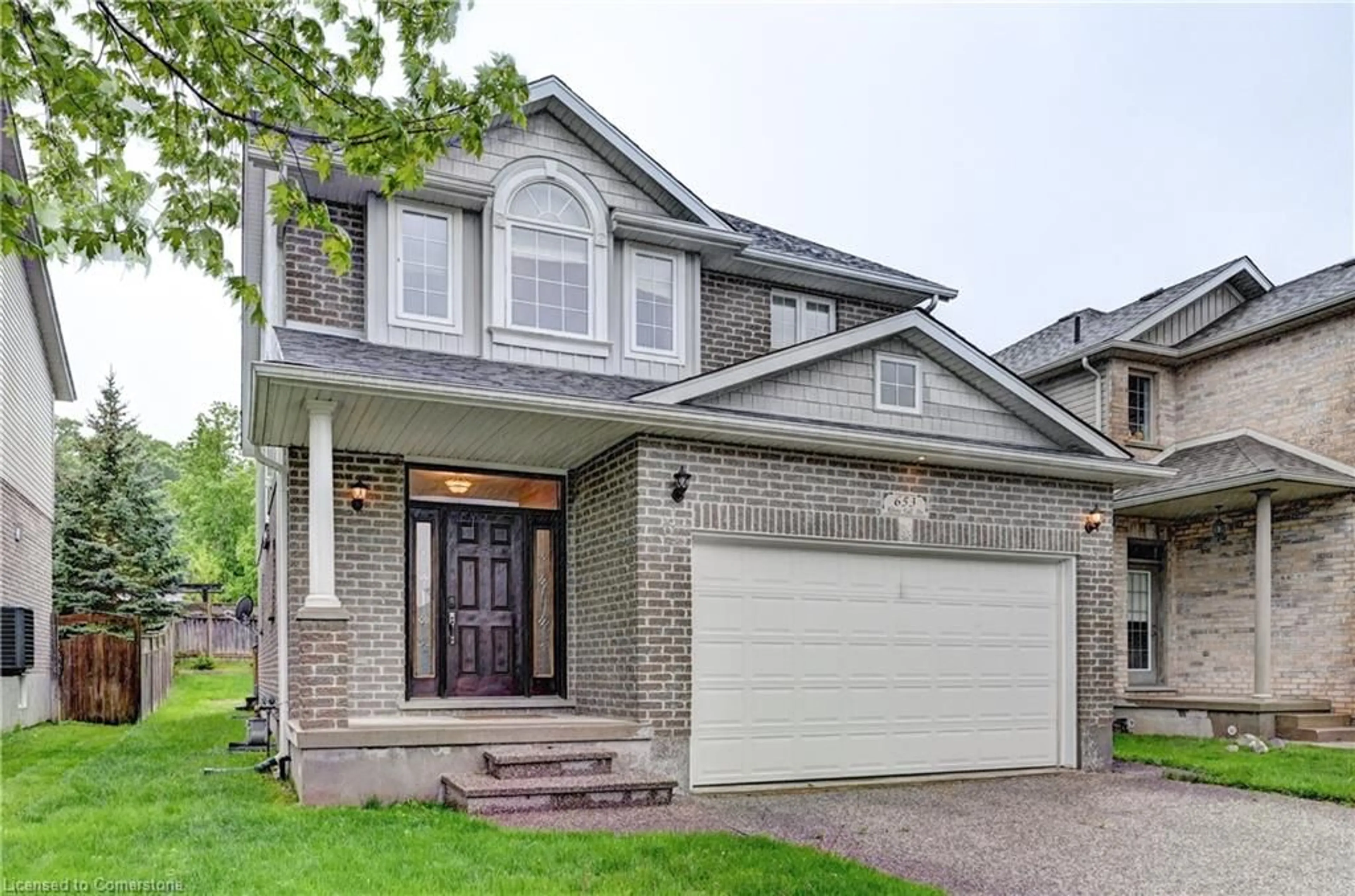 Home with brick exterior material, street for 653 Rhine Fall Dr, Waterloo Ontario N2V 2S8