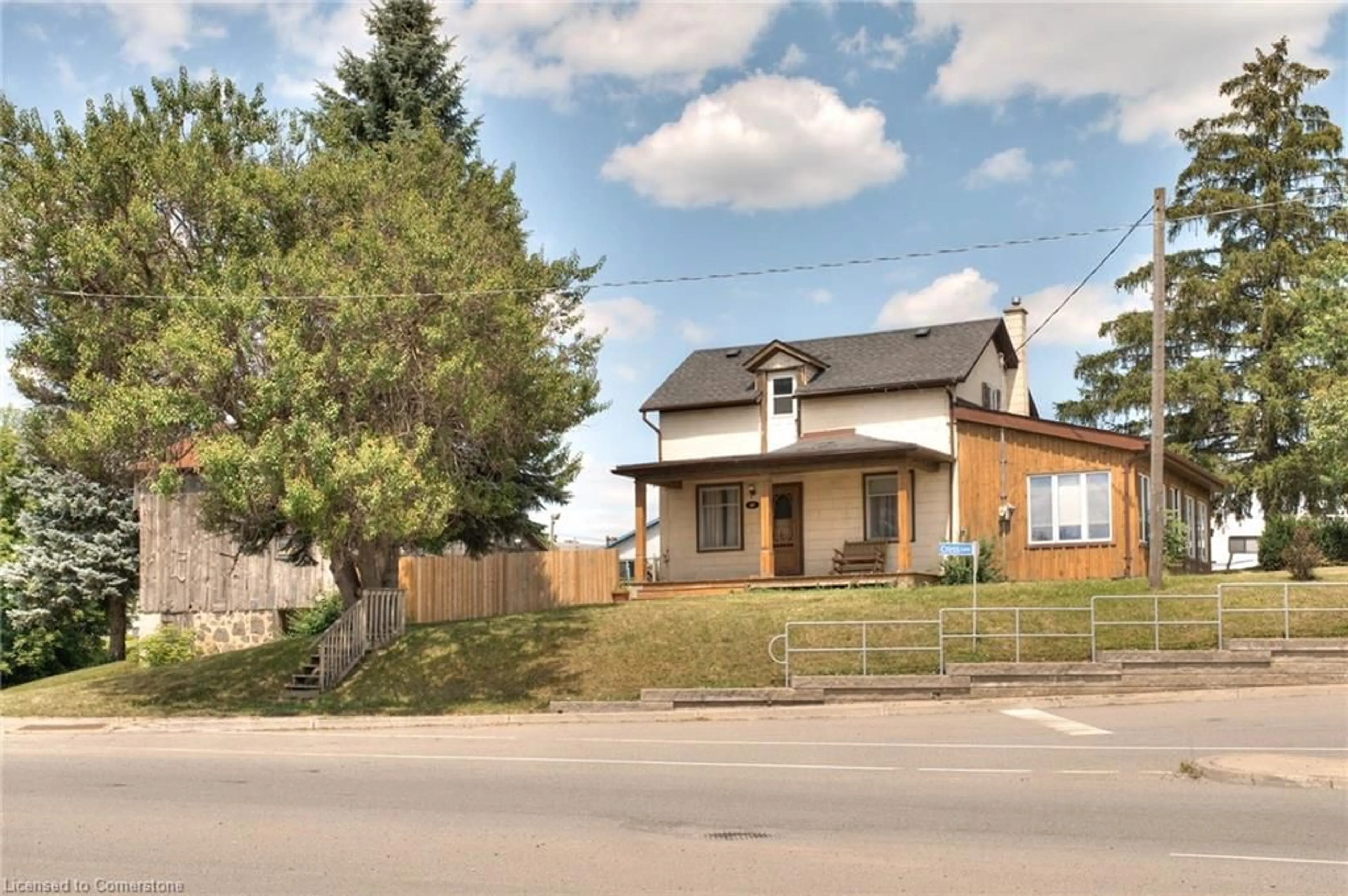 Home with brick exterior material, street for 28 Manitou Dr, Kitchener Ontario N2C 2K7