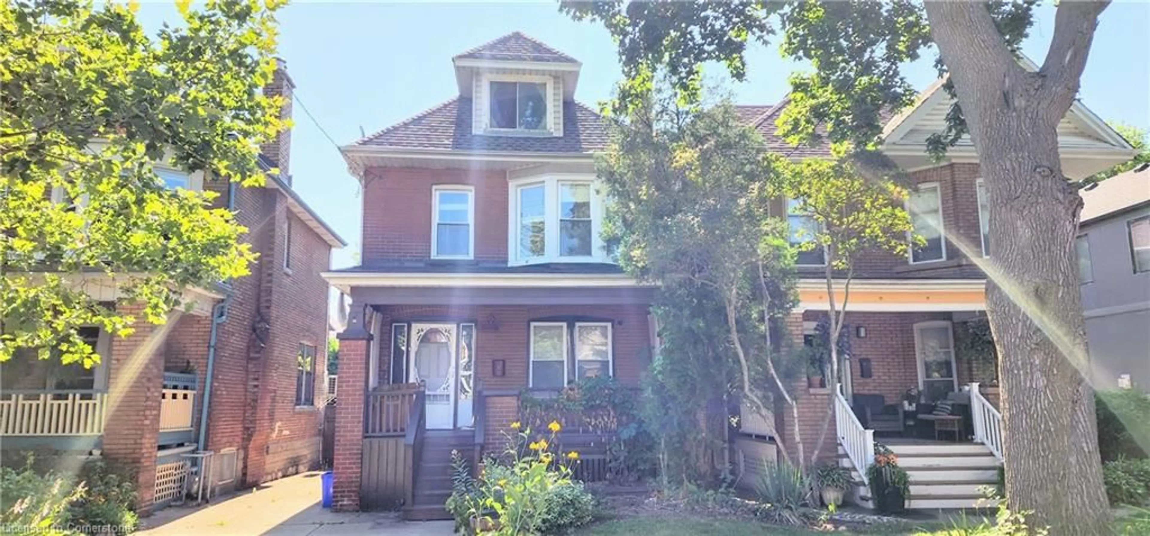 Home with brick exterior material, street for 71 Kensington Ave, Hamilton Ontario L8M 3H1