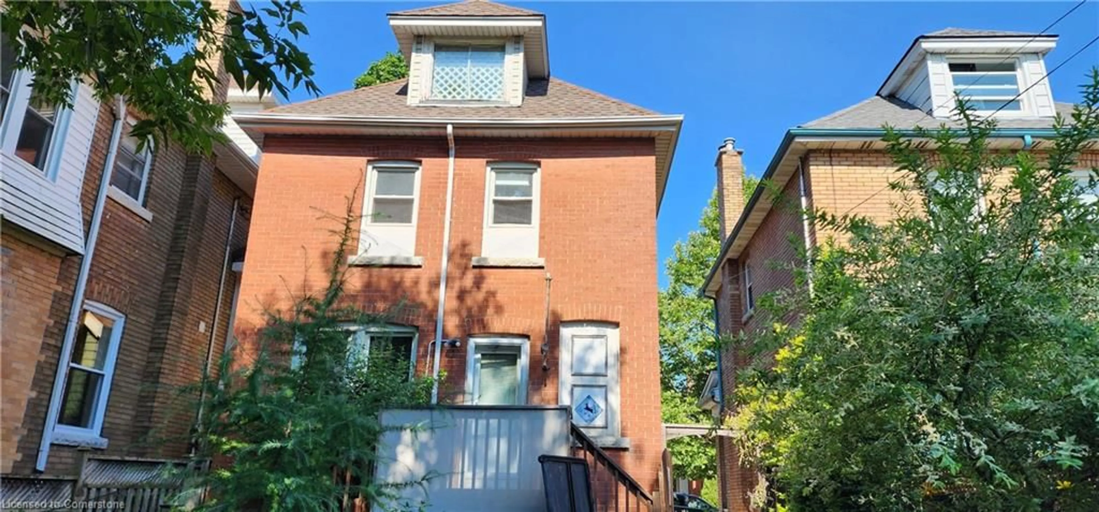 Home with brick exterior material, street for 71 Kensington Ave, Hamilton Ontario L8M 3H1