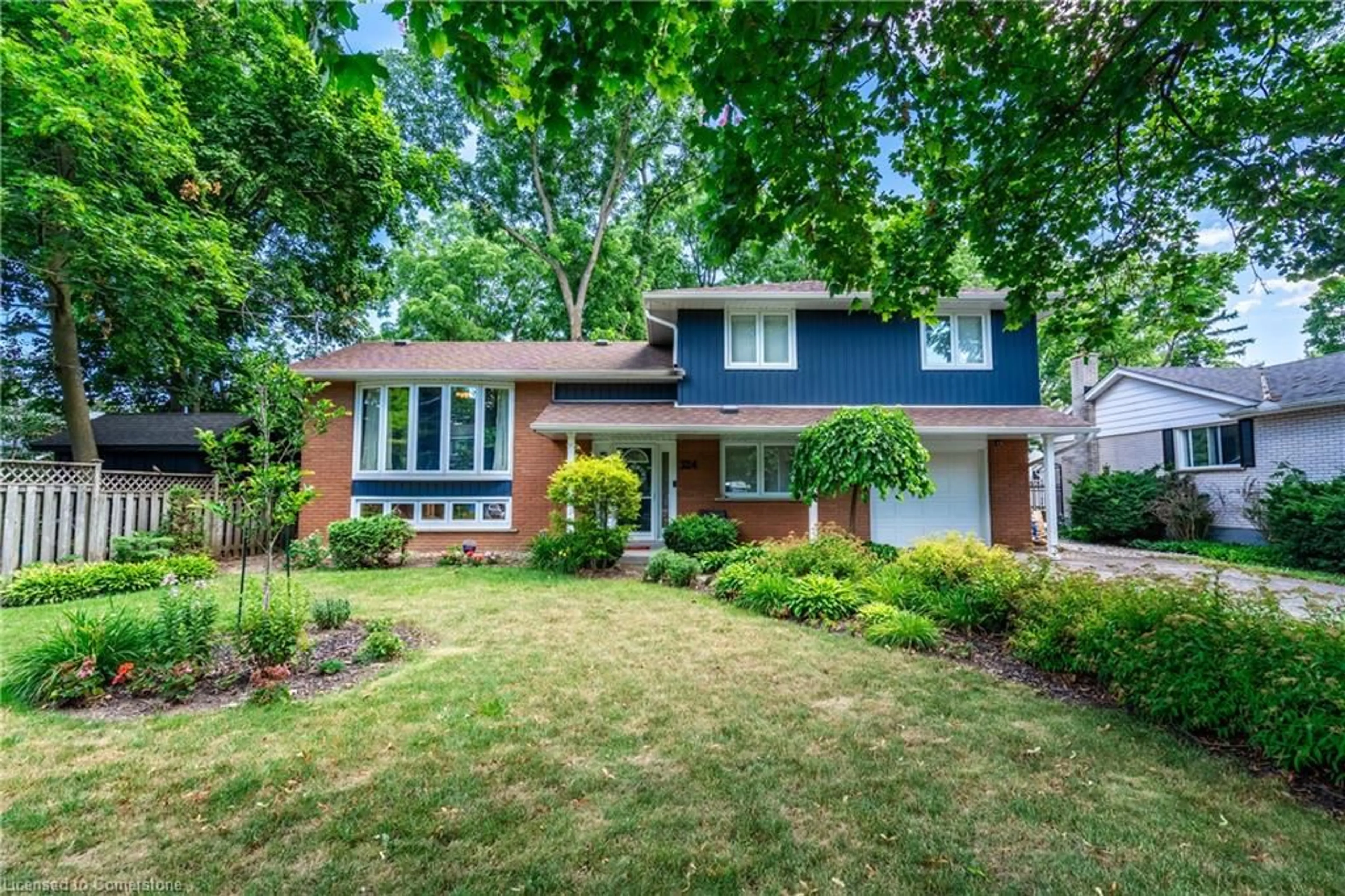 Home with brick exterior material, street for 324 Parkside Dr, Waterdown Ontario L0R 2H0