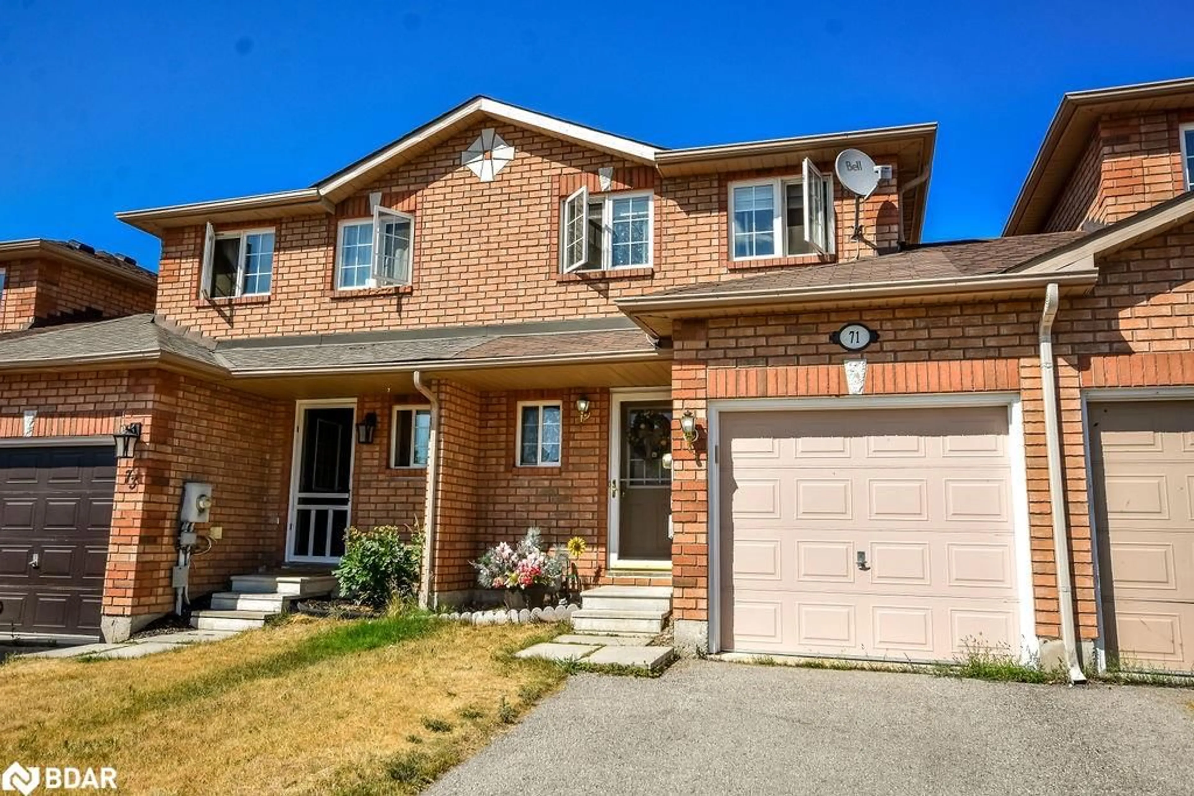Home with brick exterior material, street for 71 Goodwin Dr, Barrie Ontario L4N 5Z8