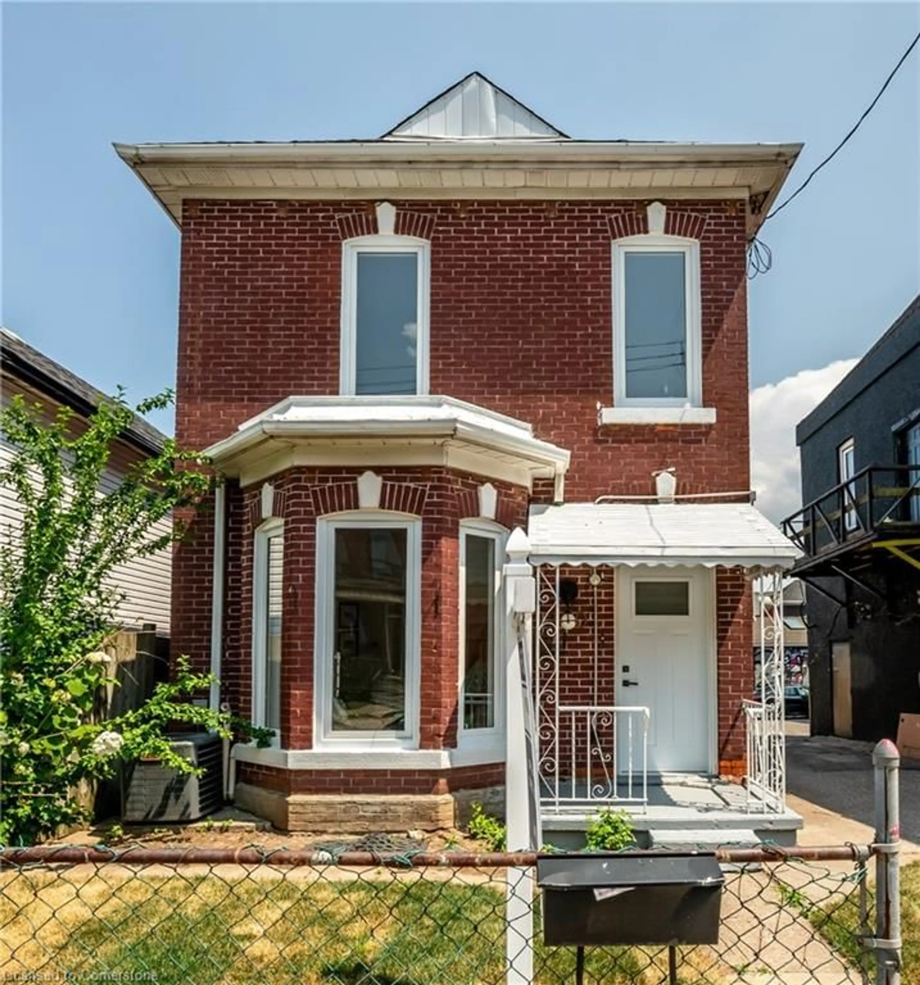 Home with brick exterior material, street for 280 Emerald St, Hamilton Ontario L8L 5L3