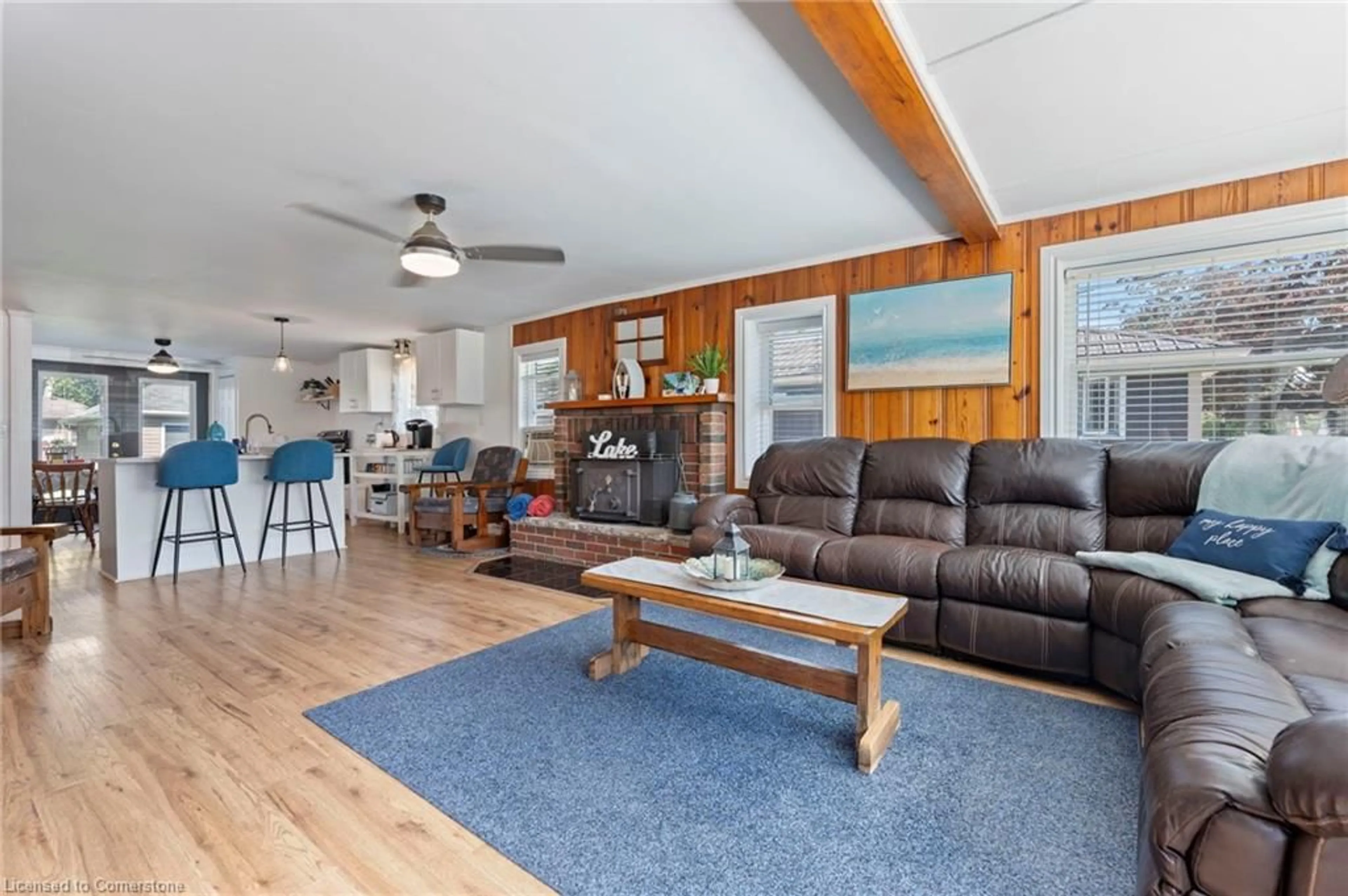 Living room with furniture, wood/laminate floor for 189 Cedar Dr, Turkey Point Ontario N0E 1T0