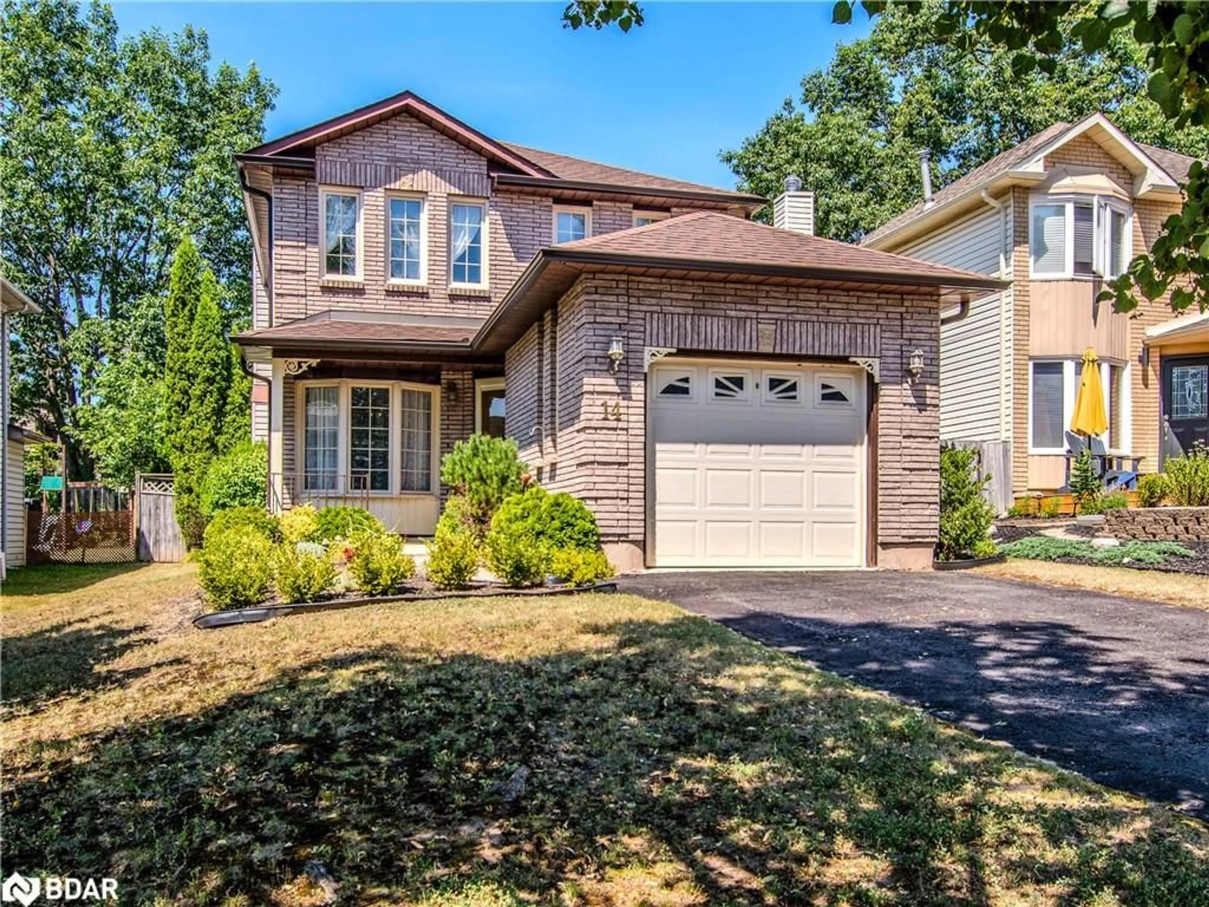 Home with brick exterior material, street for 14 Carr Dr, Barrie Ontario L4N 6N3