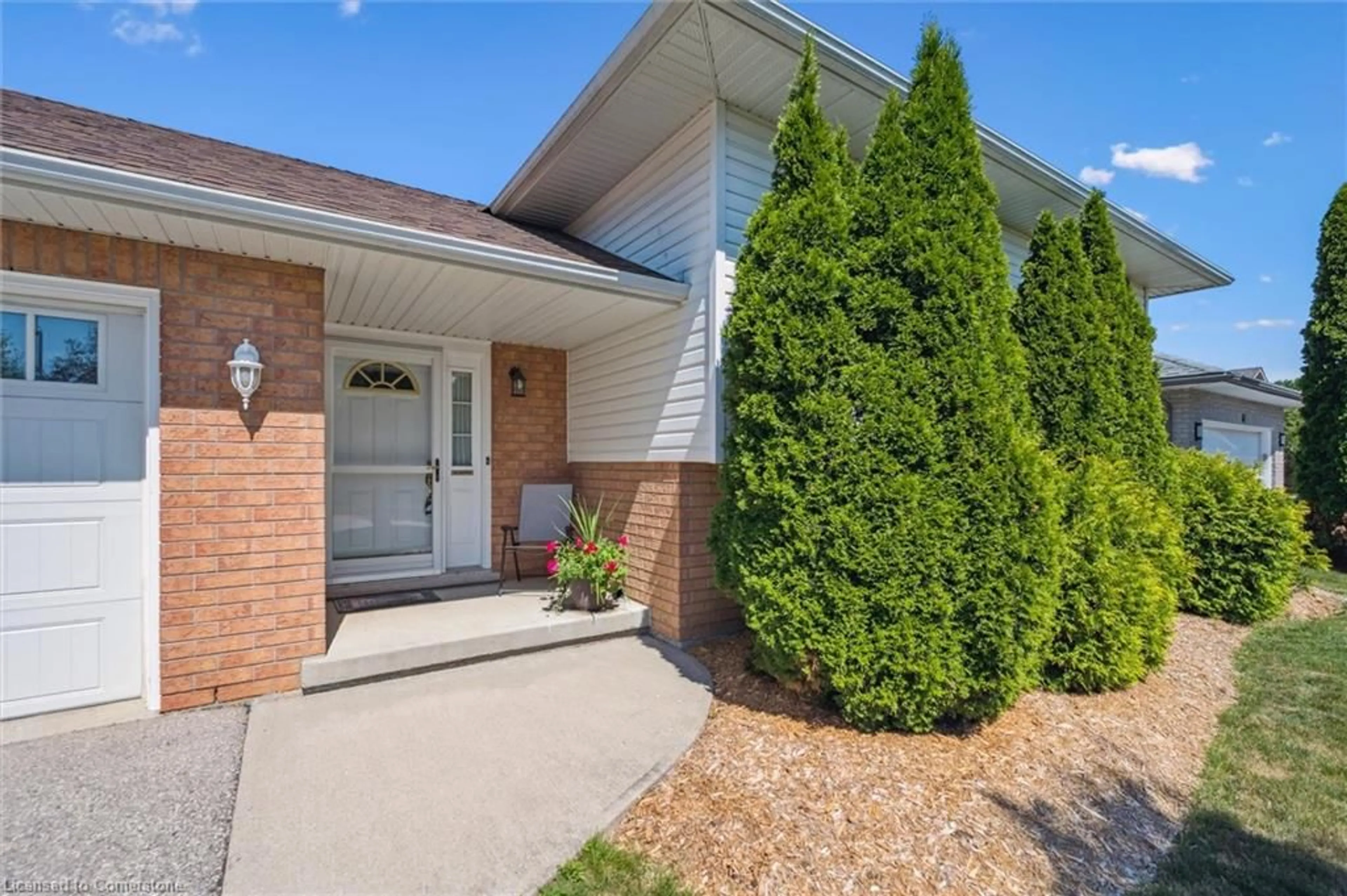 Home with brick exterior material, street for 63 Thomas Blvd, Elora Ontario N0B 1S0