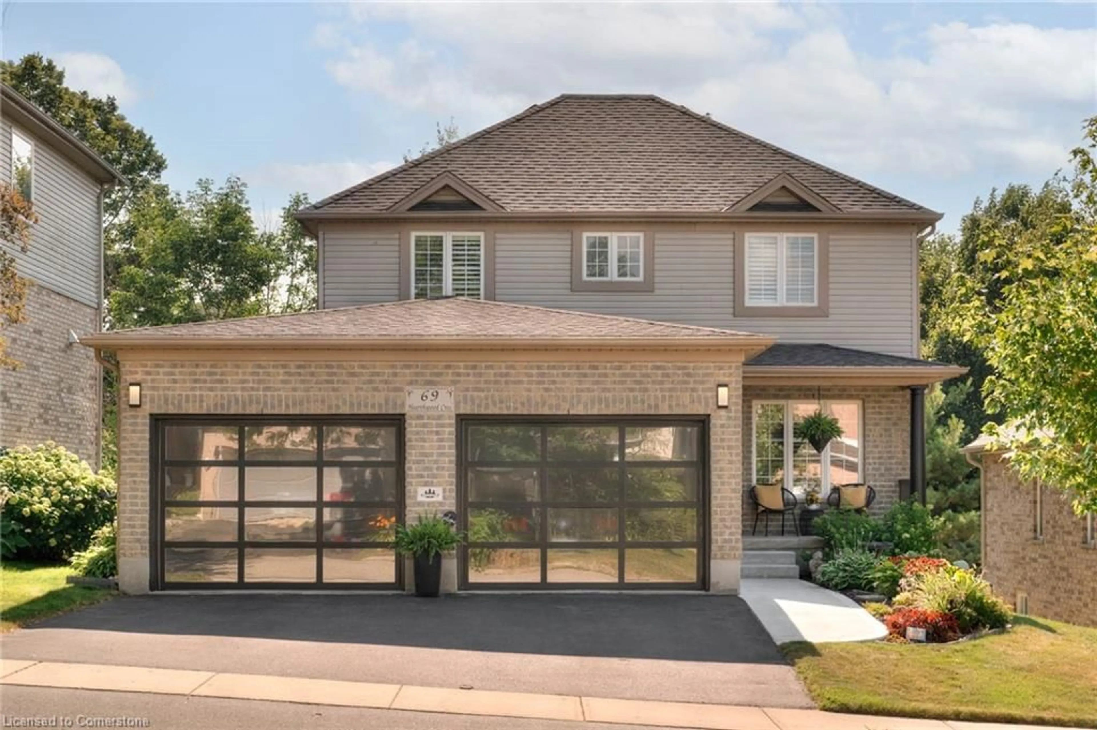 Home with brick exterior material, street for 69 Hearthwood Cres, Kitchener Ontario N2R 1K6