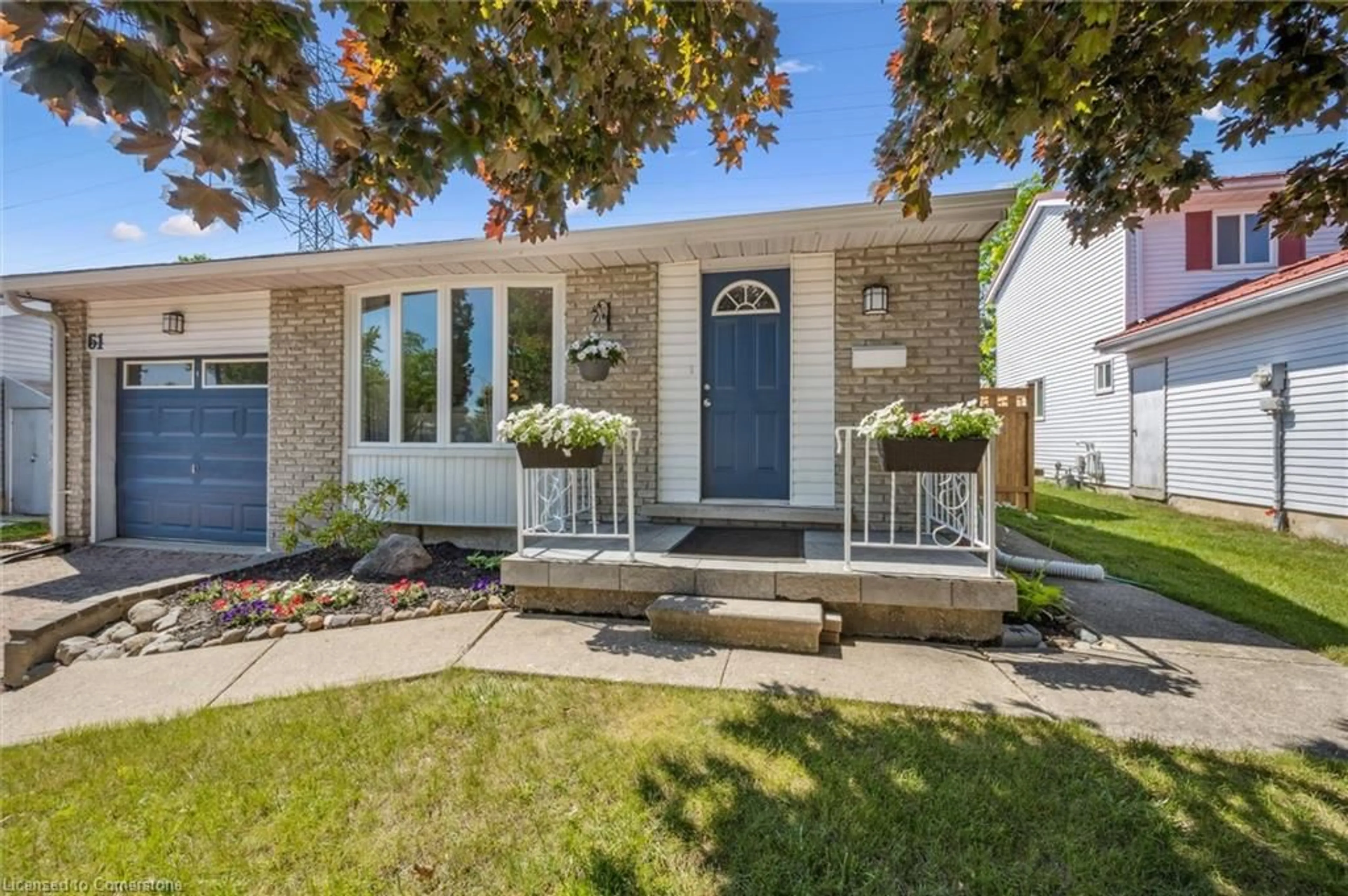 Home with vinyl exterior material, street for 61 Rolling Meadows Dr, Kitchener Ontario N2N 1T4