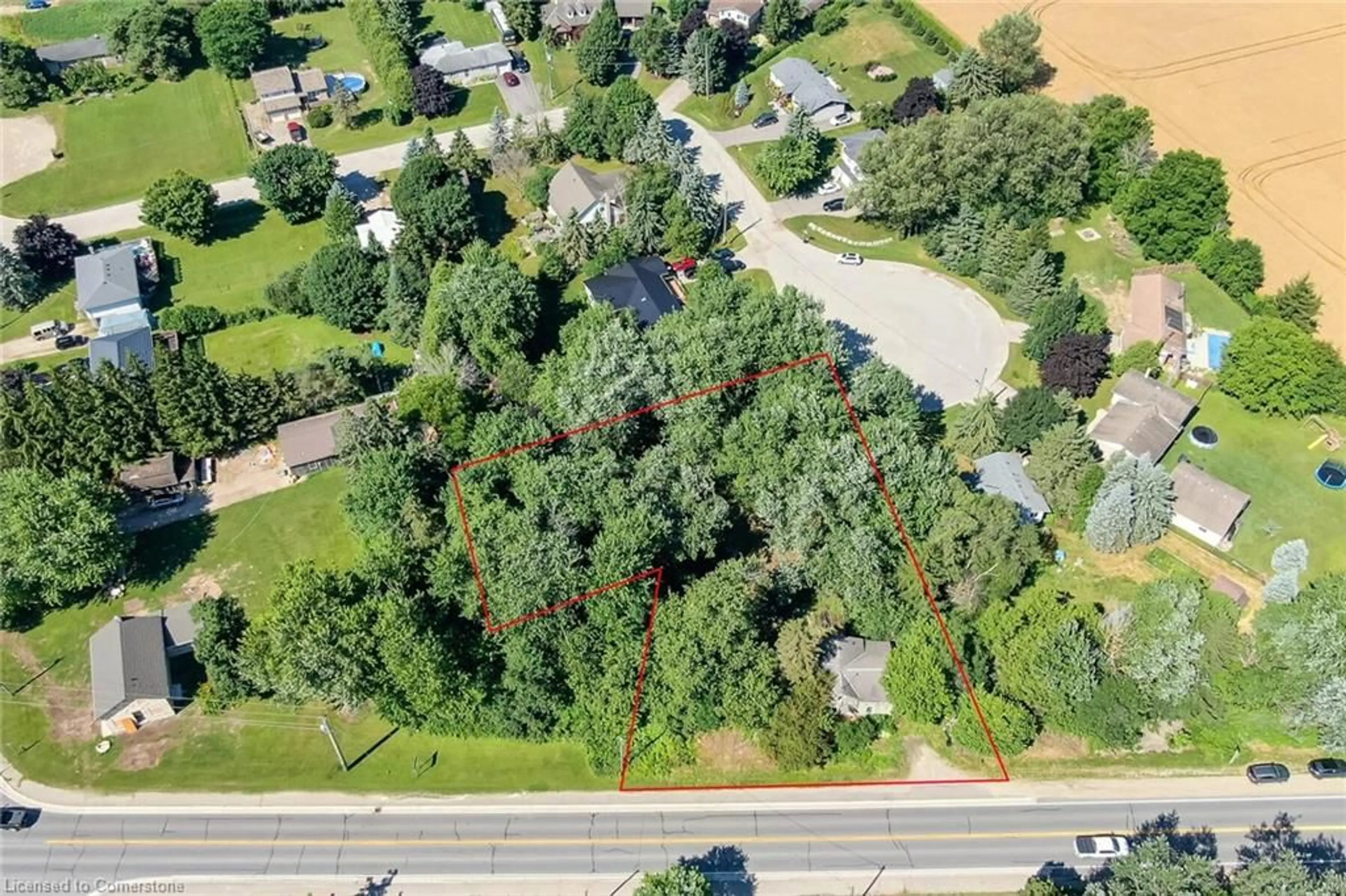 A pic from outside/outdoor area/front of a property/back of a property/a pic from drone, street for 6052 Highway 6 Line, Wellington Ontario N0B 1S0