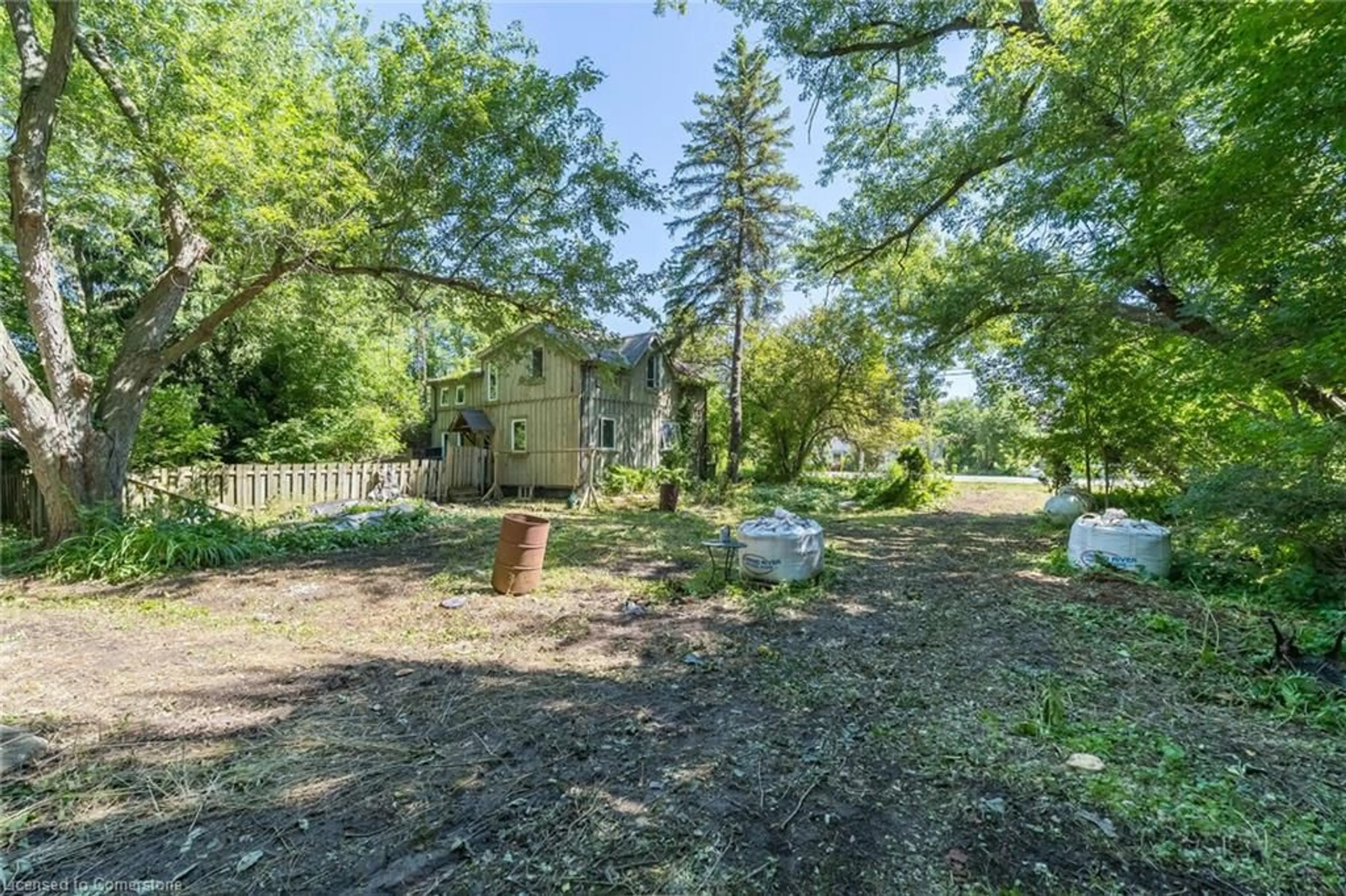 A pic from outside/outdoor area/front of a property/back of a property/a pic from drone, forest/trees view for 6052 Highway 6 Line, Wellington Ontario N0B 1S0