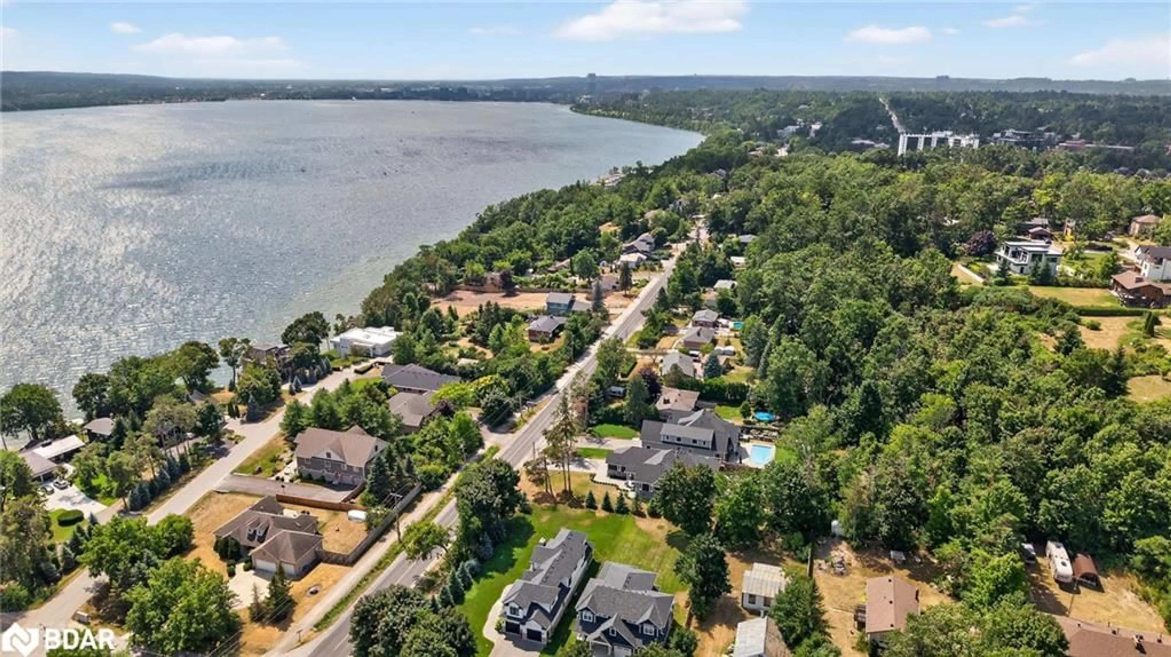 A pic from outside/outdoor area/front of a property/back of a property/a pic from drone, water/lake/river/ocean view for 300 Shanty Bay Rd, Barrie Ontario L4M 1E6