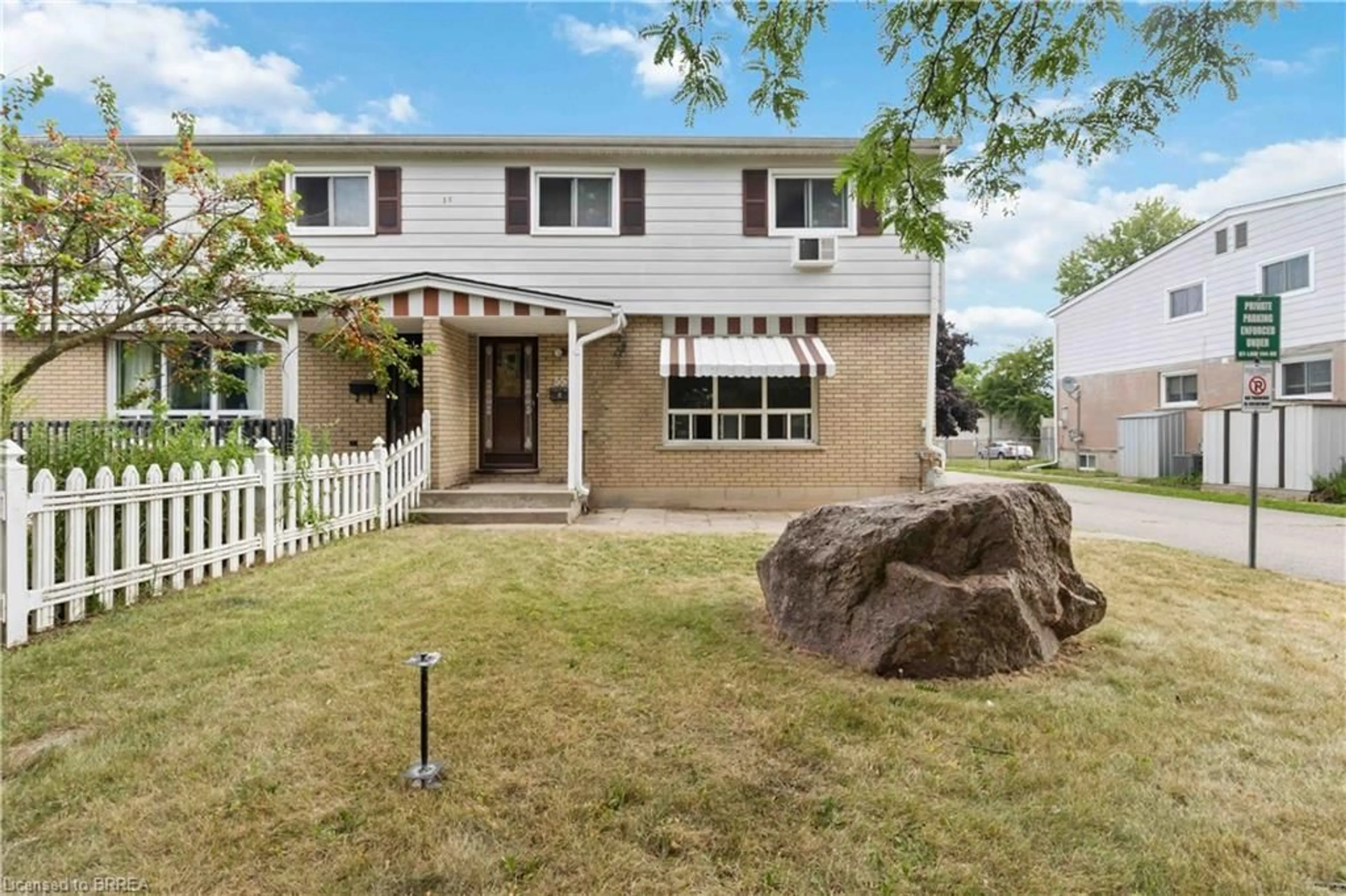 Home with vinyl exterior material, street for 55 Metcalfe Cres #23, Brantford Ontario N3R 2L7
