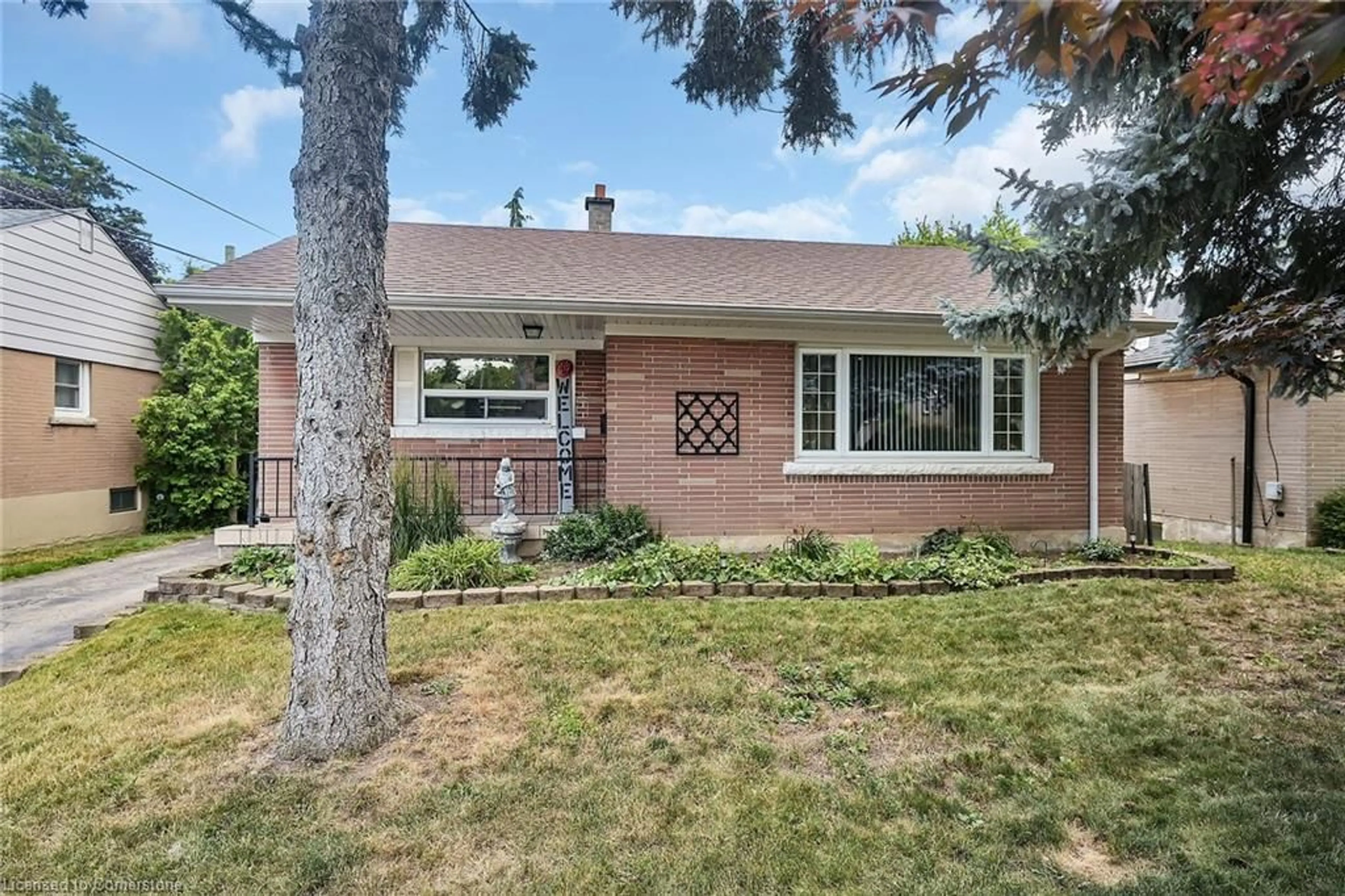 Home with brick exterior material, street for 305 East 36th St, Hamilton Ontario L8V 3Z7