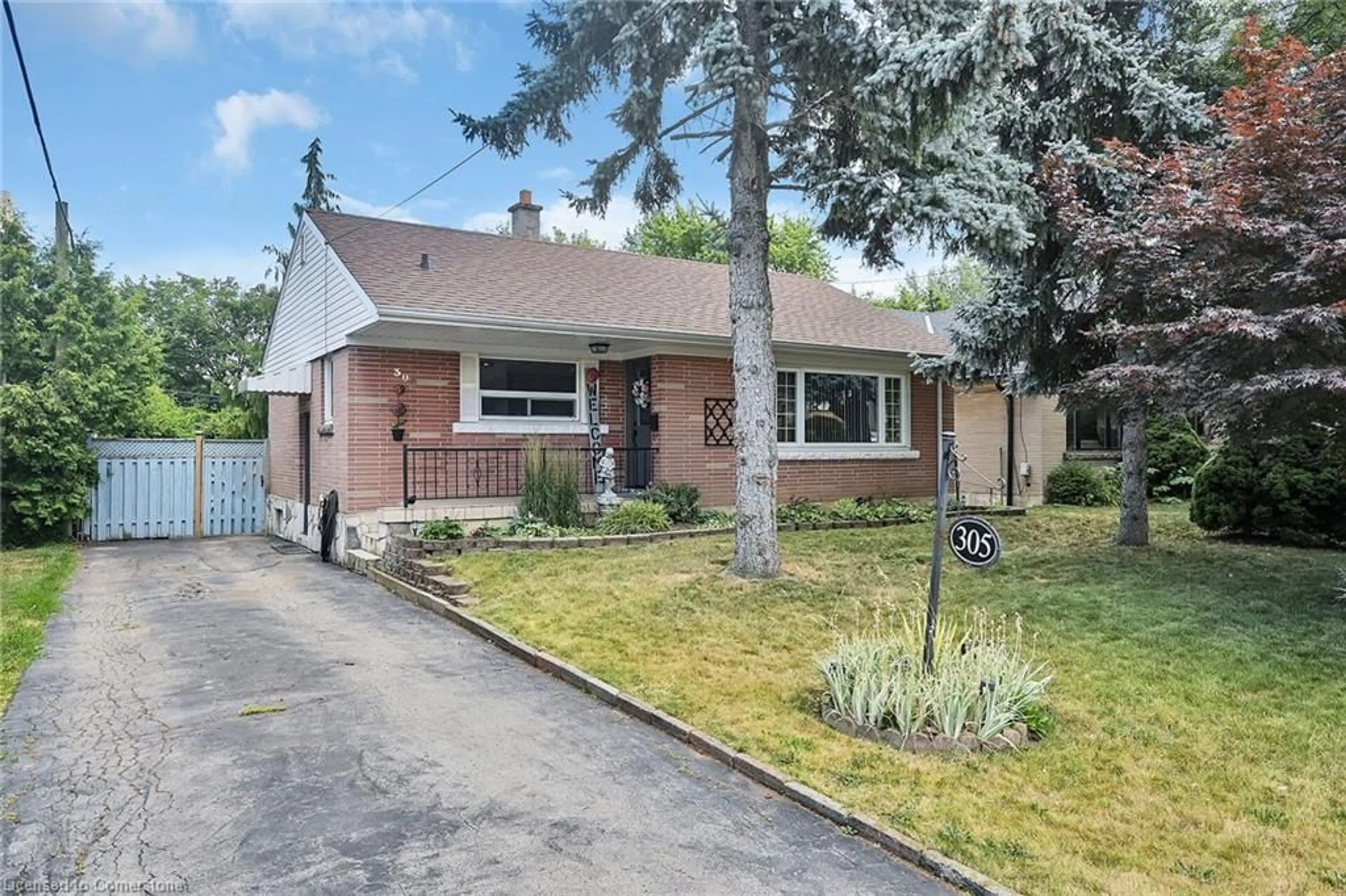 Home with brick exterior material, street for 305 East 36th St, Hamilton Ontario L8V 3Z7