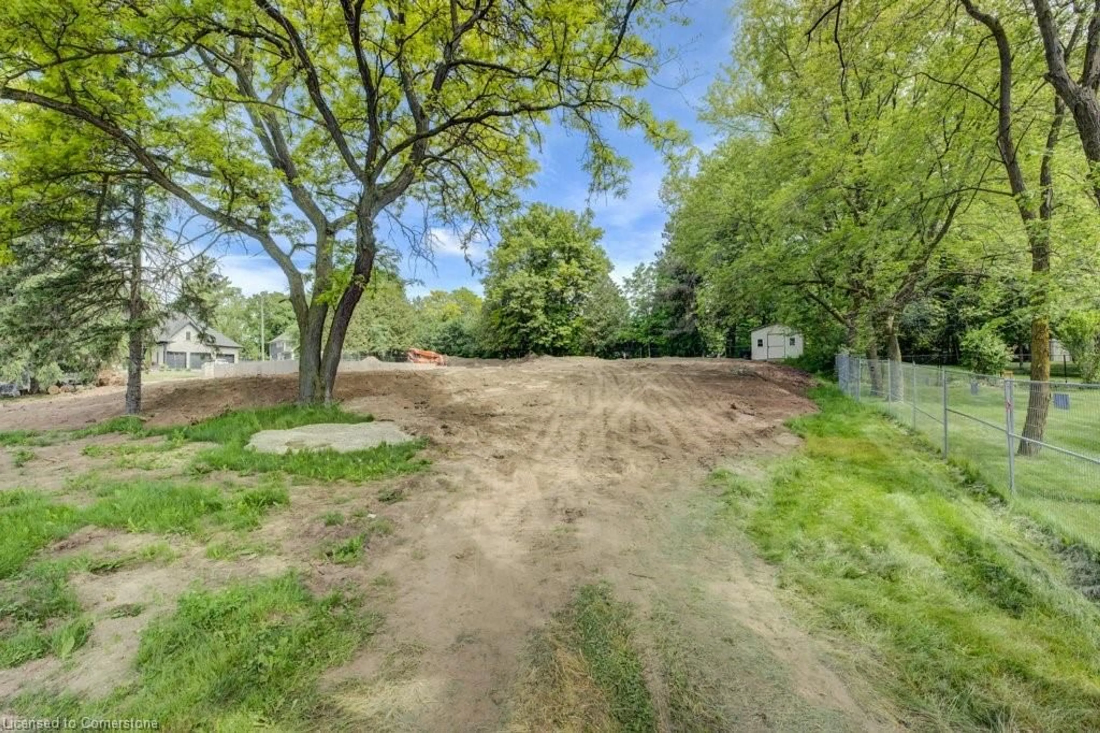 A pic from outside/outdoor area/front of a property/back of a property/a pic from drone, forest/trees view for 416 Woolwich St, Waterloo Ontario N2K 2L3