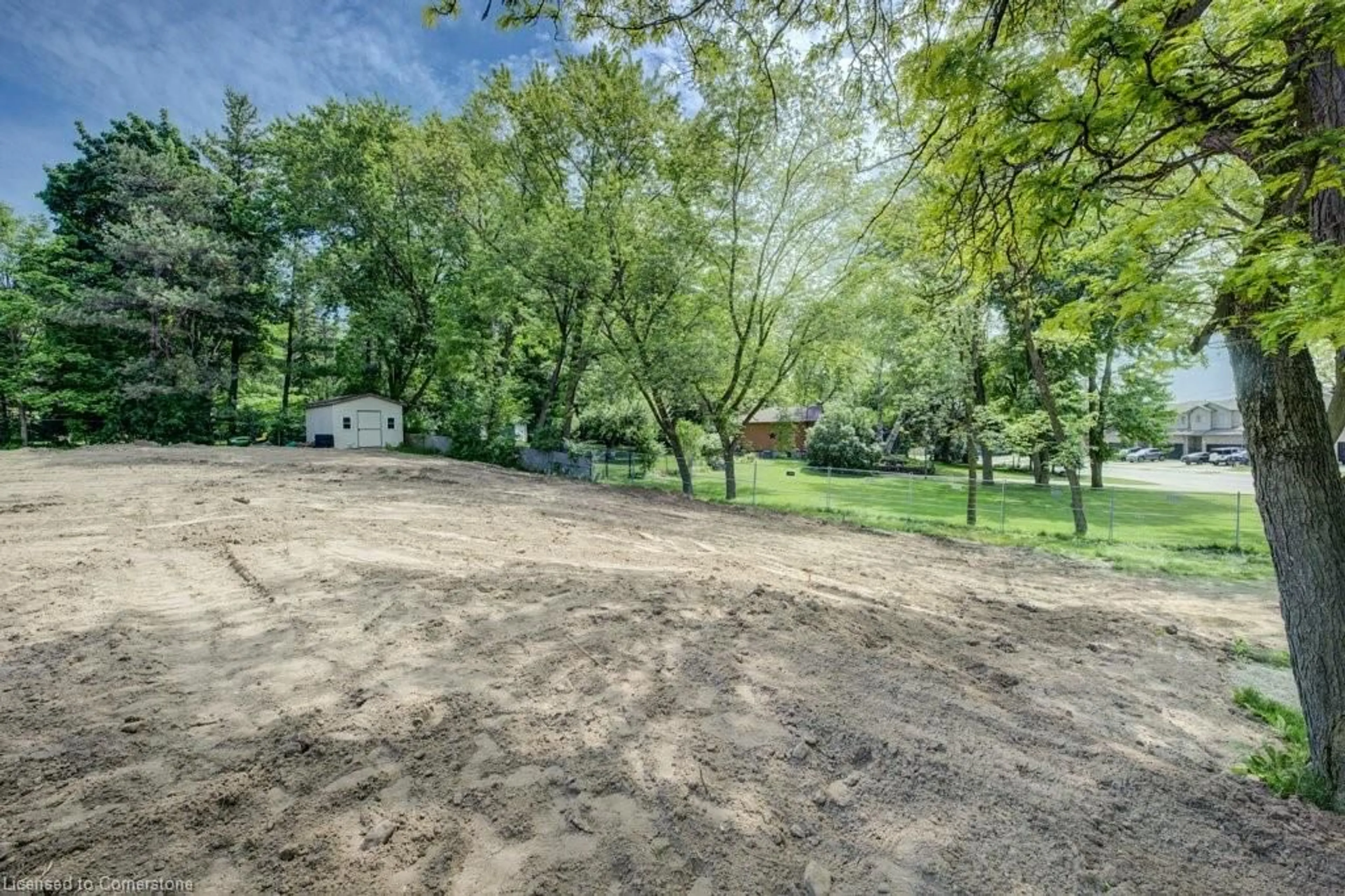 A pic from outside/outdoor area/front of a property/back of a property/a pic from drone, forest/trees view for 416 Woolwich St, Waterloo Ontario N2K 2L3