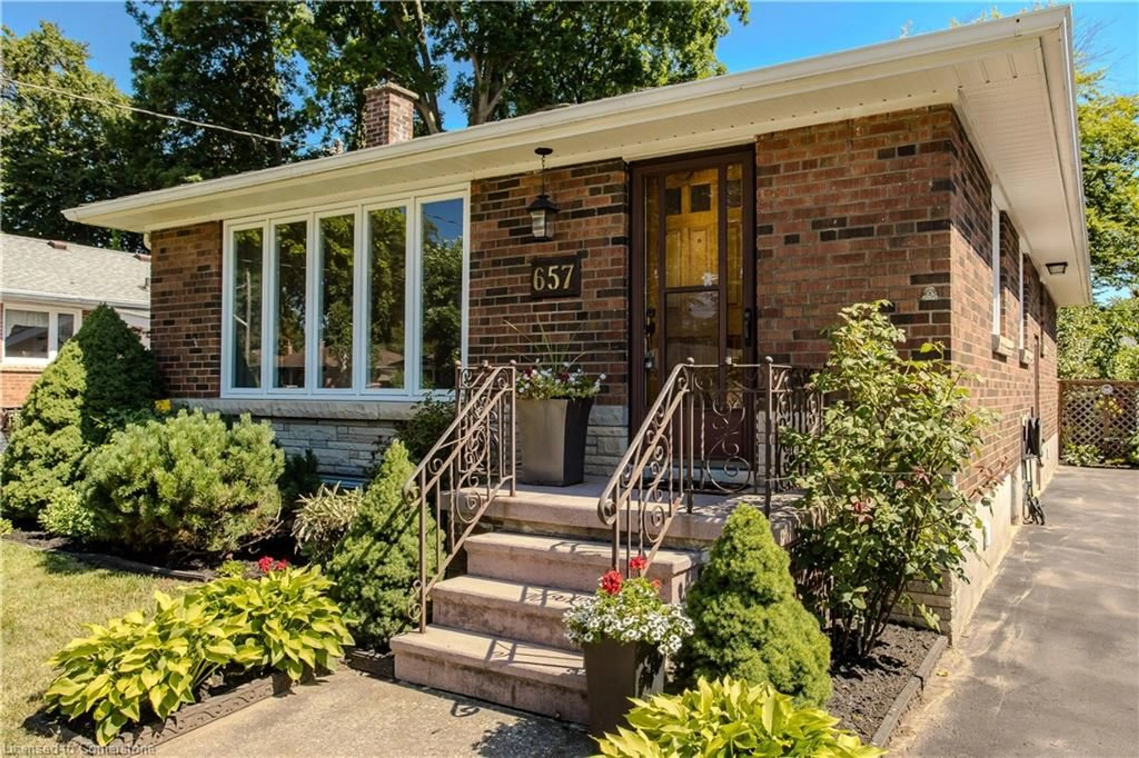 Home with brick exterior material, street for 657 Ashley Ave, Burlington Ontario L7R 2Y9