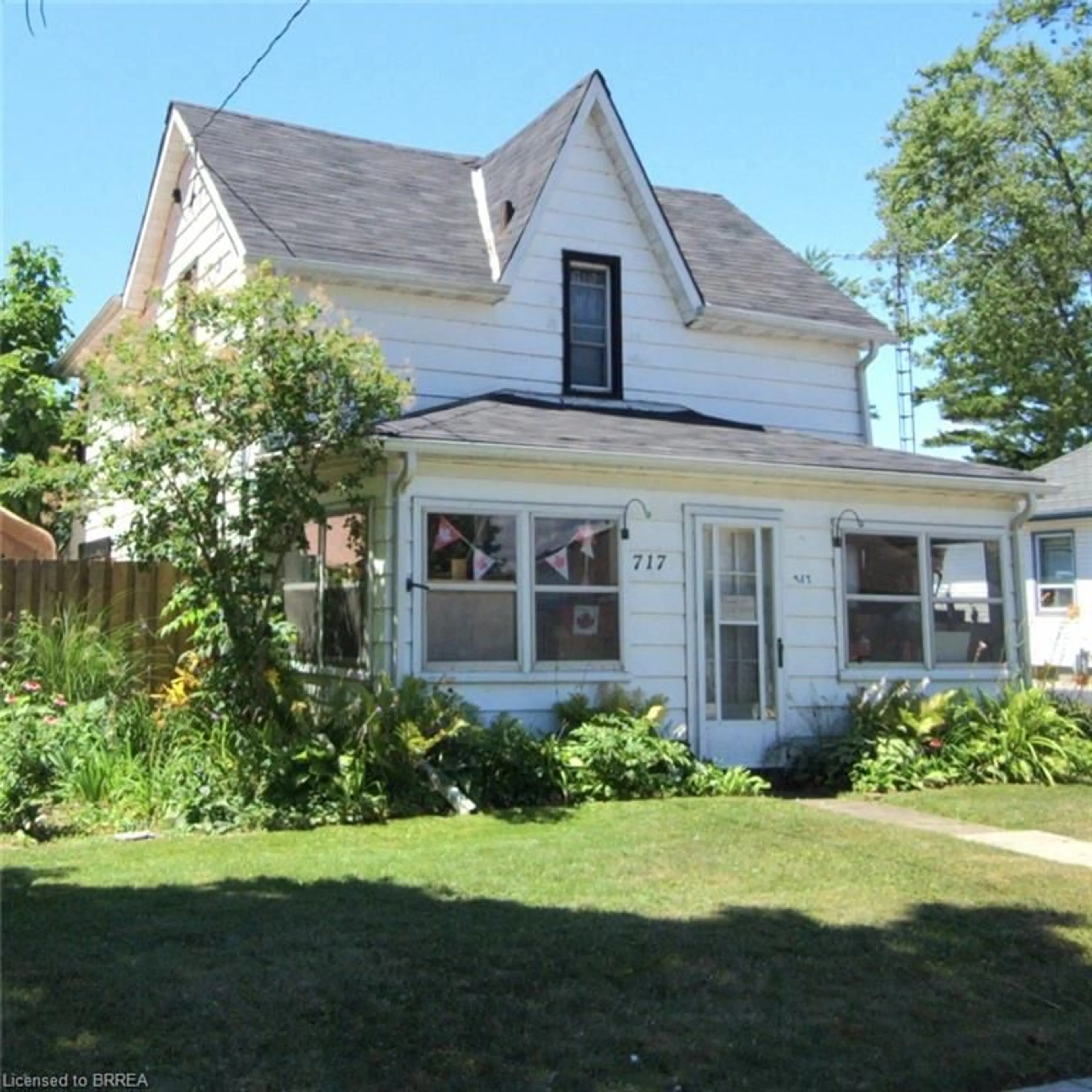Home with vinyl exterior material, street for 717 Main St, Port Dover Ontario N0A 1N0