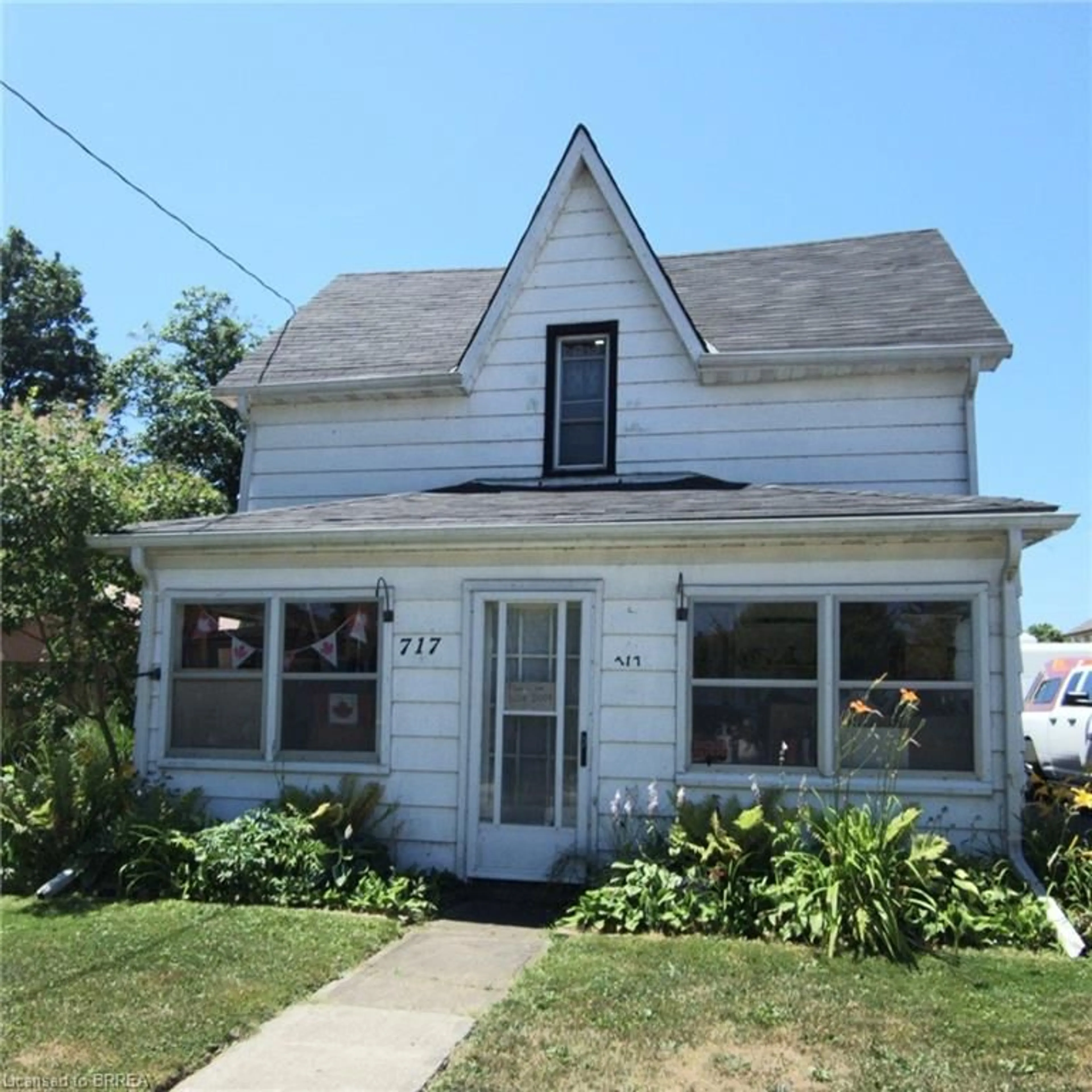 Home with vinyl exterior material, street for 717 Main St, Port Dover Ontario N0A 1N0