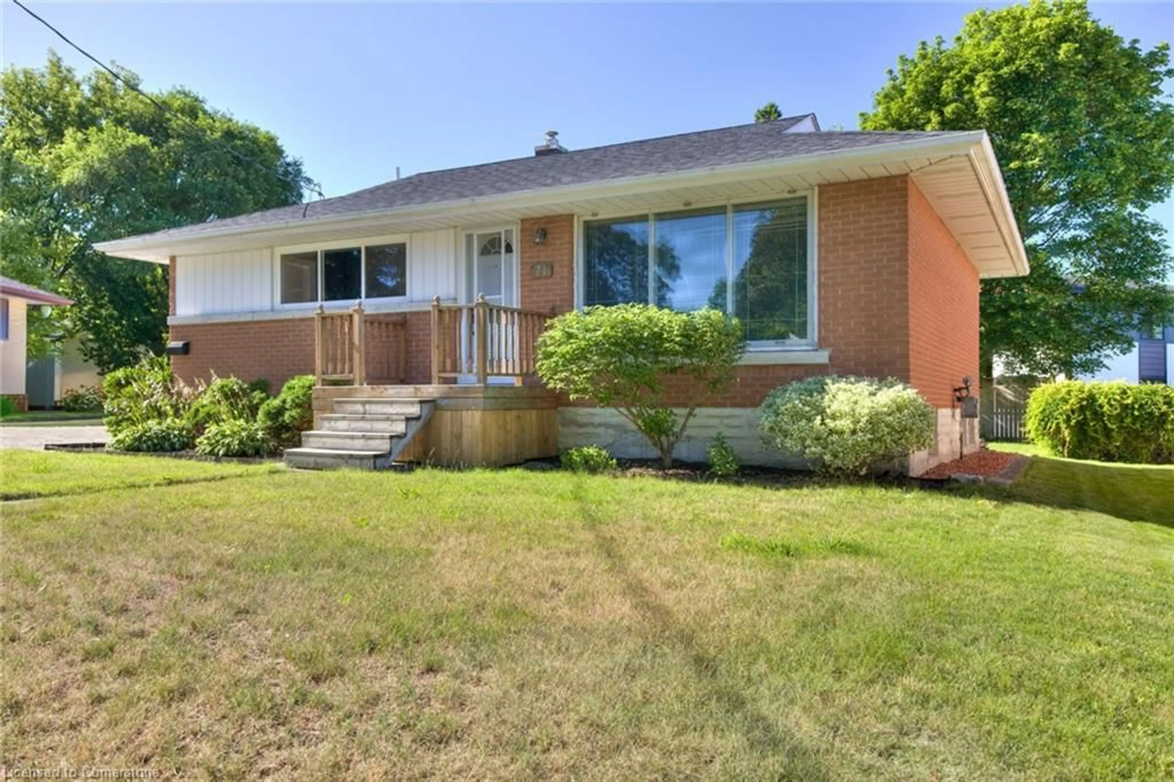 Home with brick exterior material, street for 71 Broadmoor Ave, Kitchener Ontario N2C 1Y6