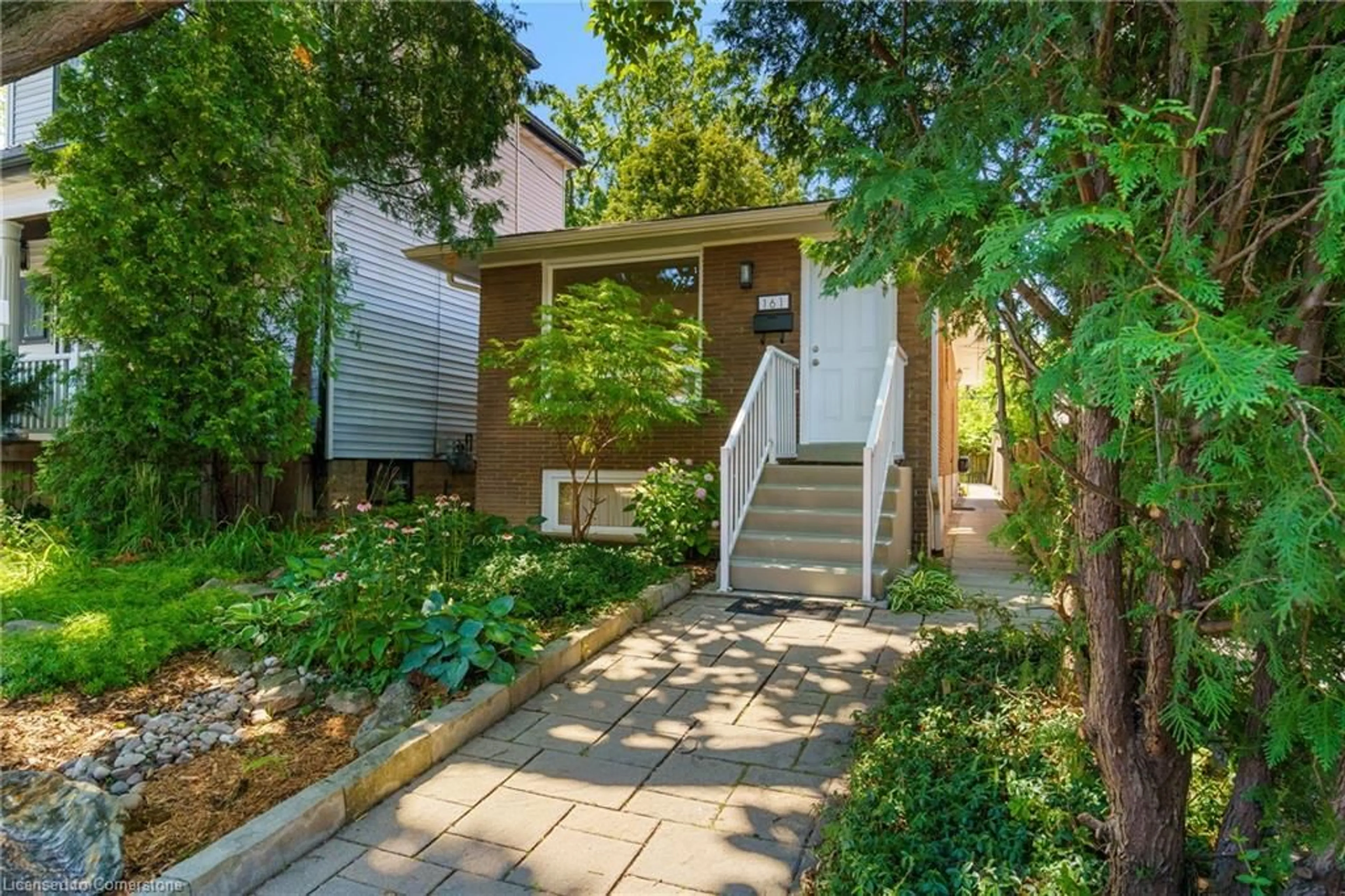 Home with brick exterior material, street for 161 Homewood Ave, Hamilton Ontario L8P 2M6