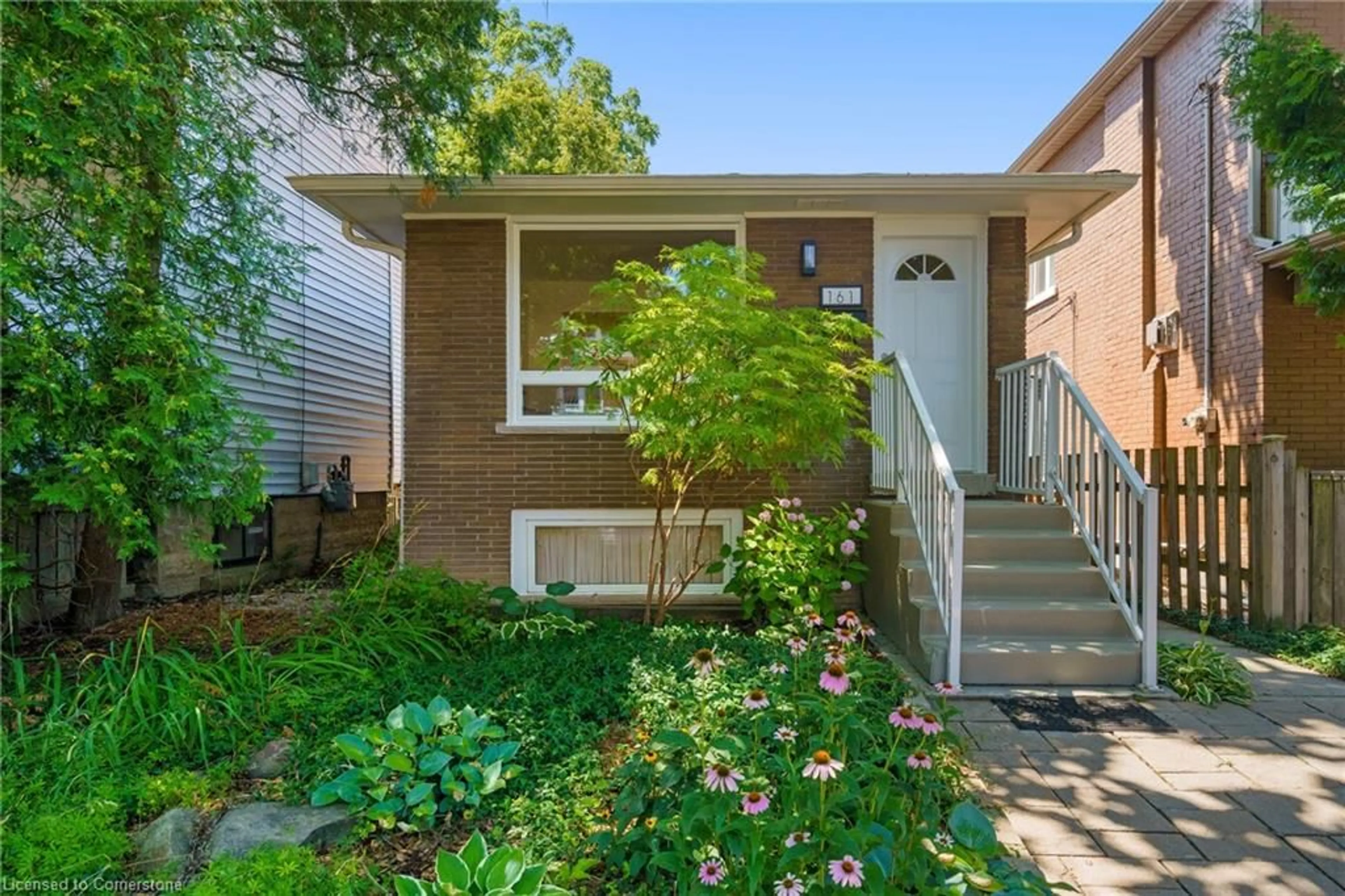 Home with brick exterior material, street for 161 Homewood Ave, Hamilton Ontario L8P 2M6
