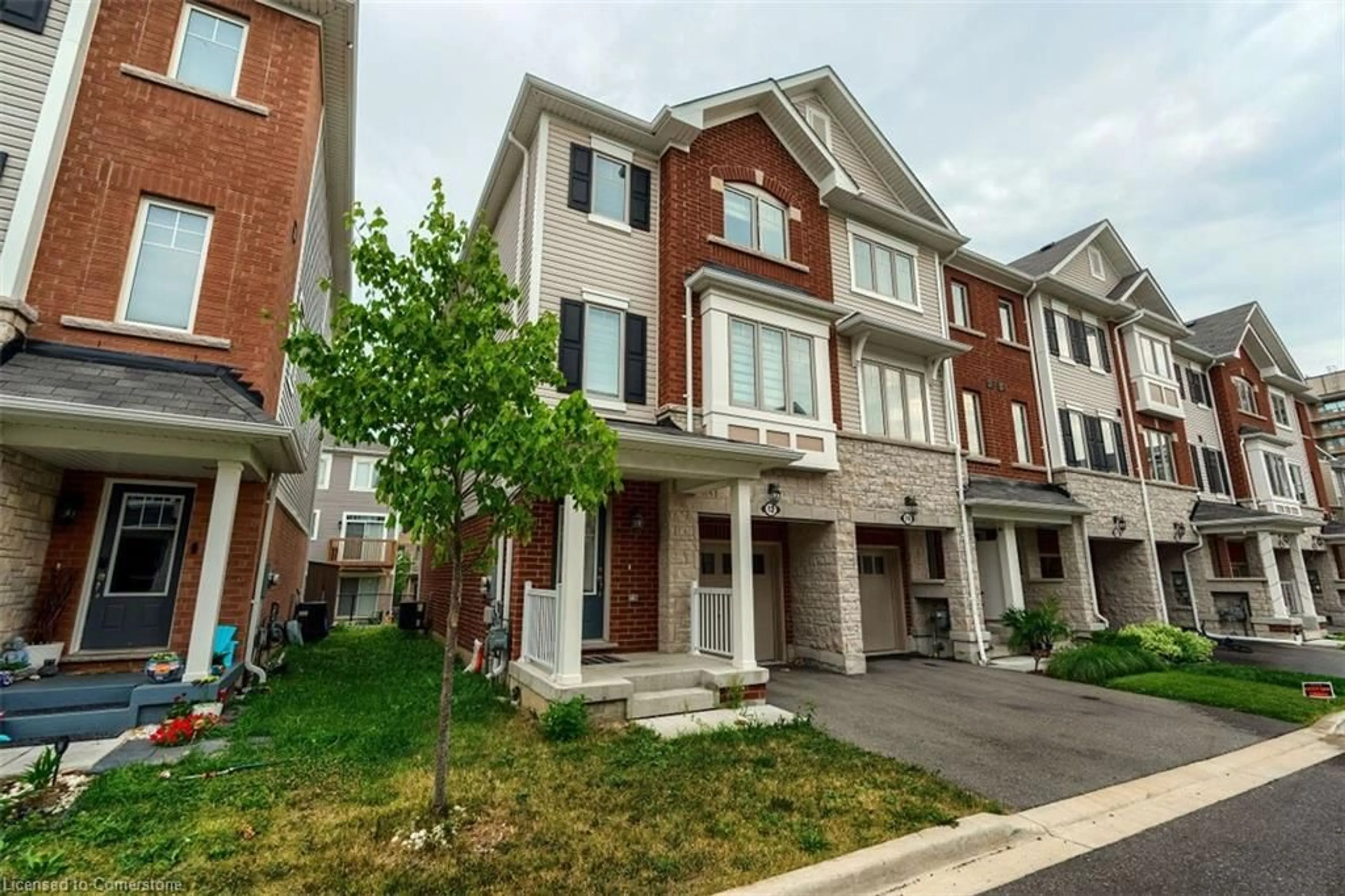 Home with brick exterior material, street for 12 Rapids Lane, Hamilton Ontario L8K 0A3