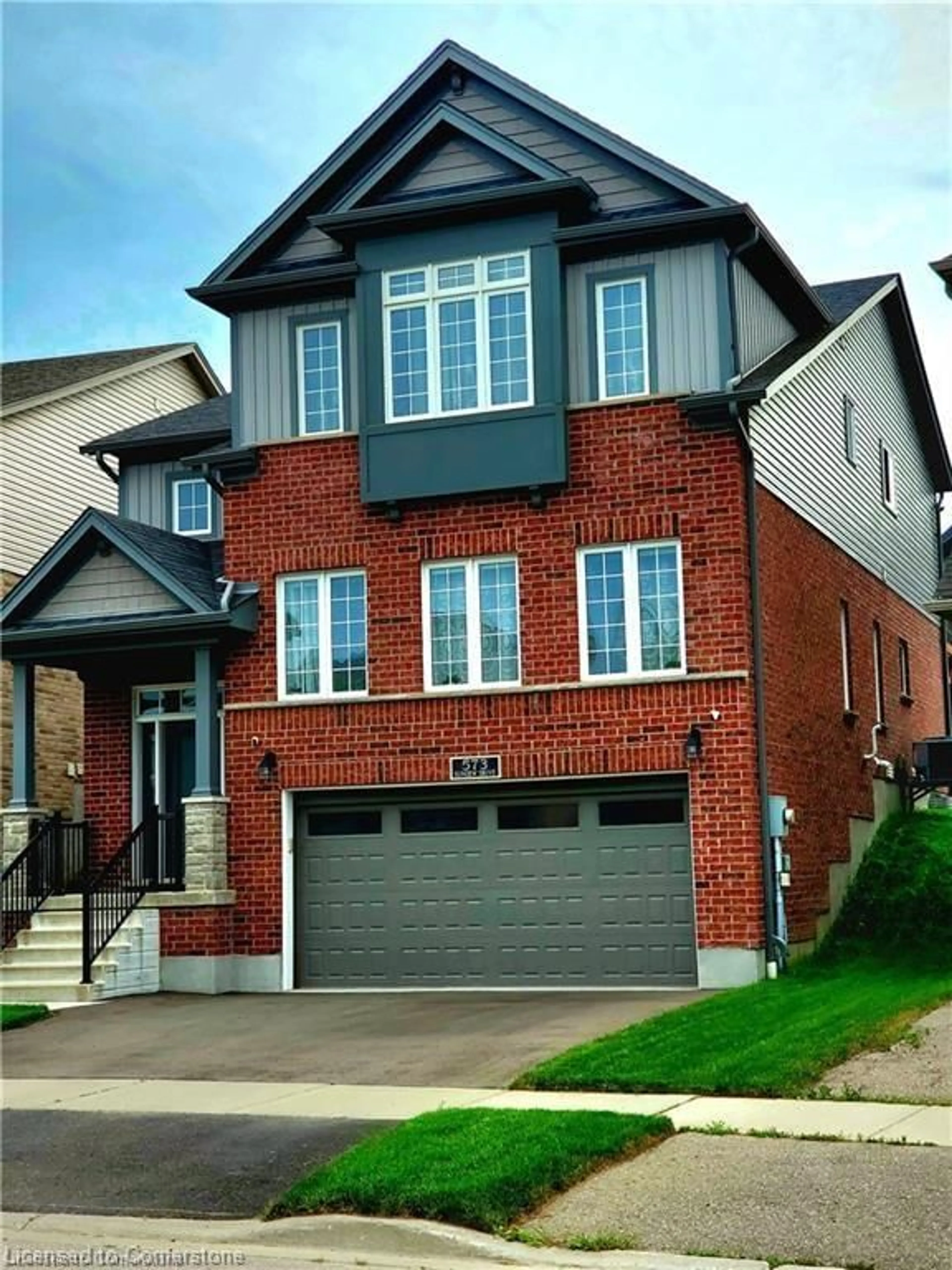Home with brick exterior material, street for 573 Sundew Dr, Waterloo Ontario N2V 0B9