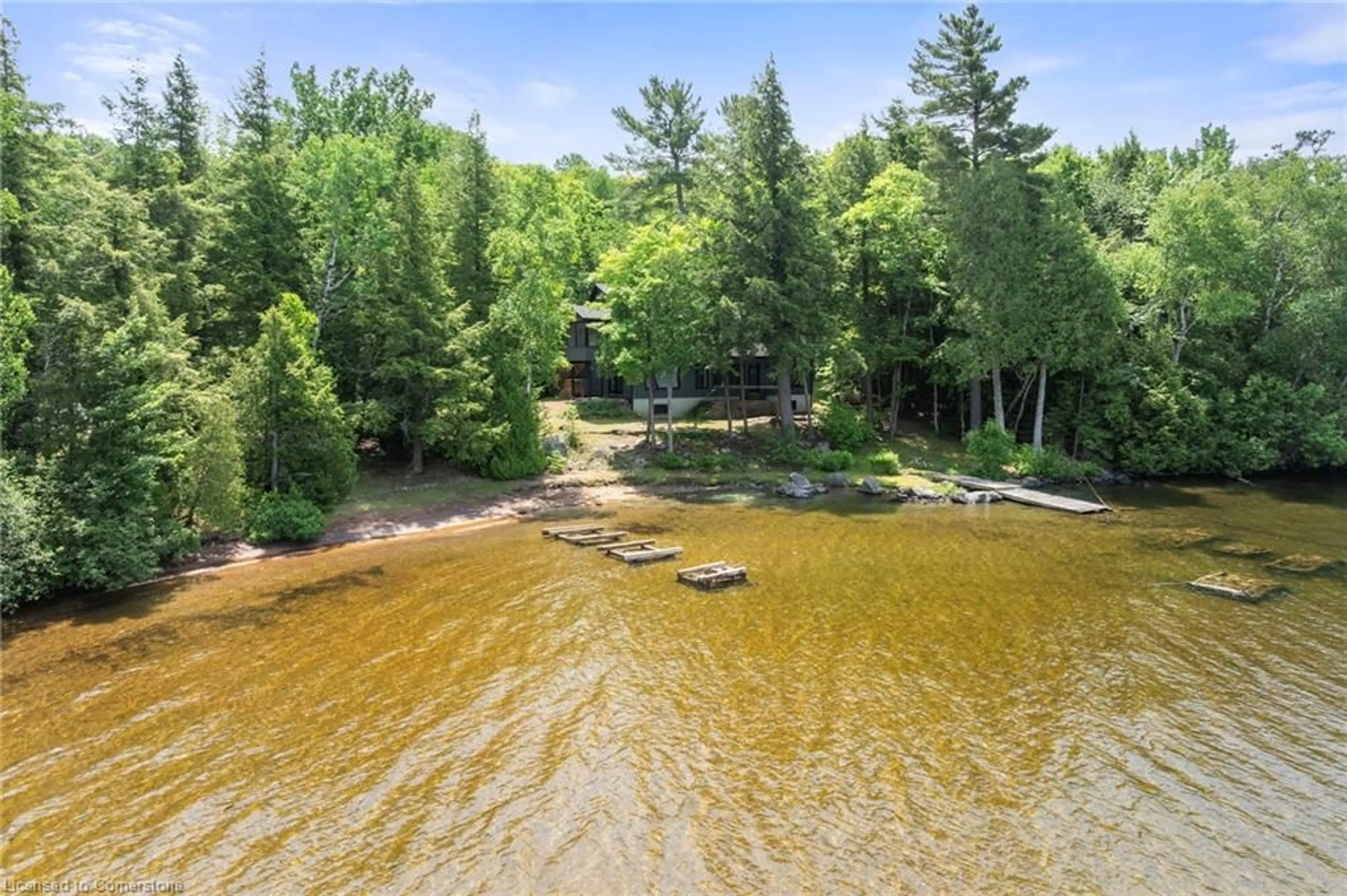 A pic from outside/outdoor area/front of a property/back of a property/a pic from drone, water/lake/river/ocean view for 1009 Scotts Boathouse Rd, Baysville Ontario P0B 1A0