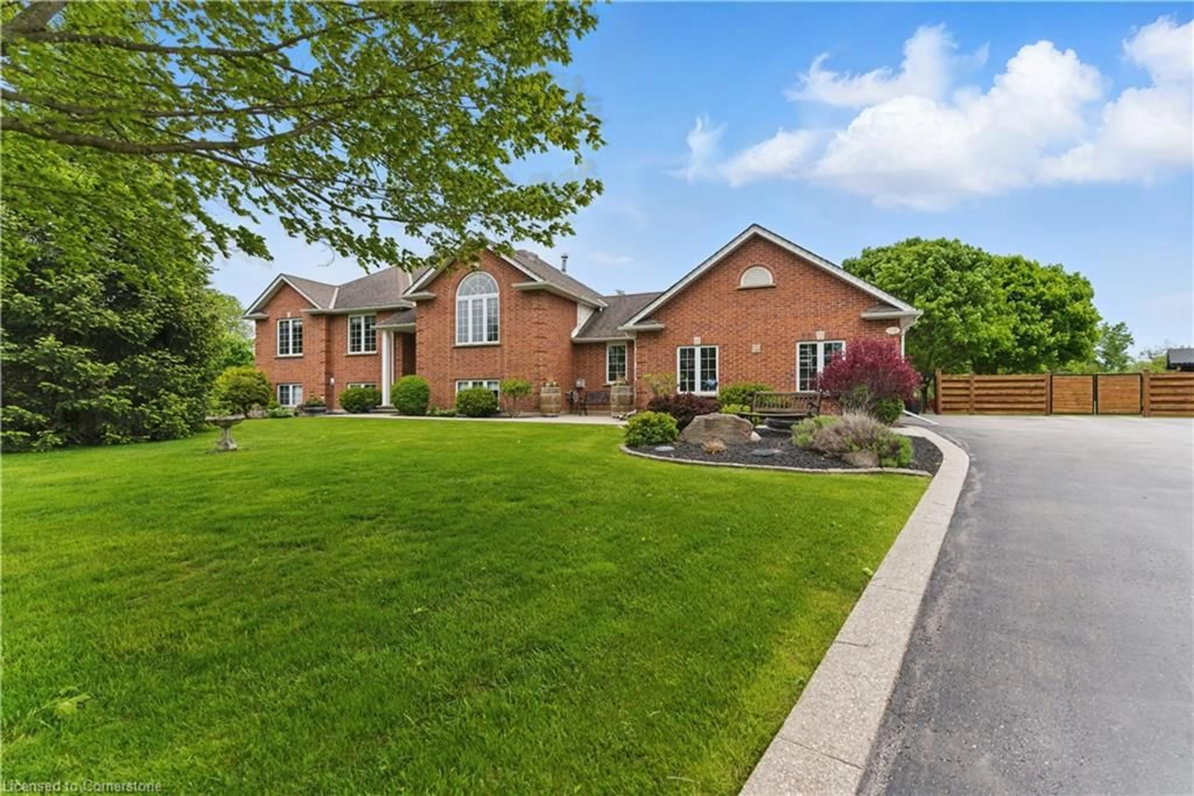 Home with brick exterior material, street for 16 Credit River Rd, Erin Ontario N0B 1T0