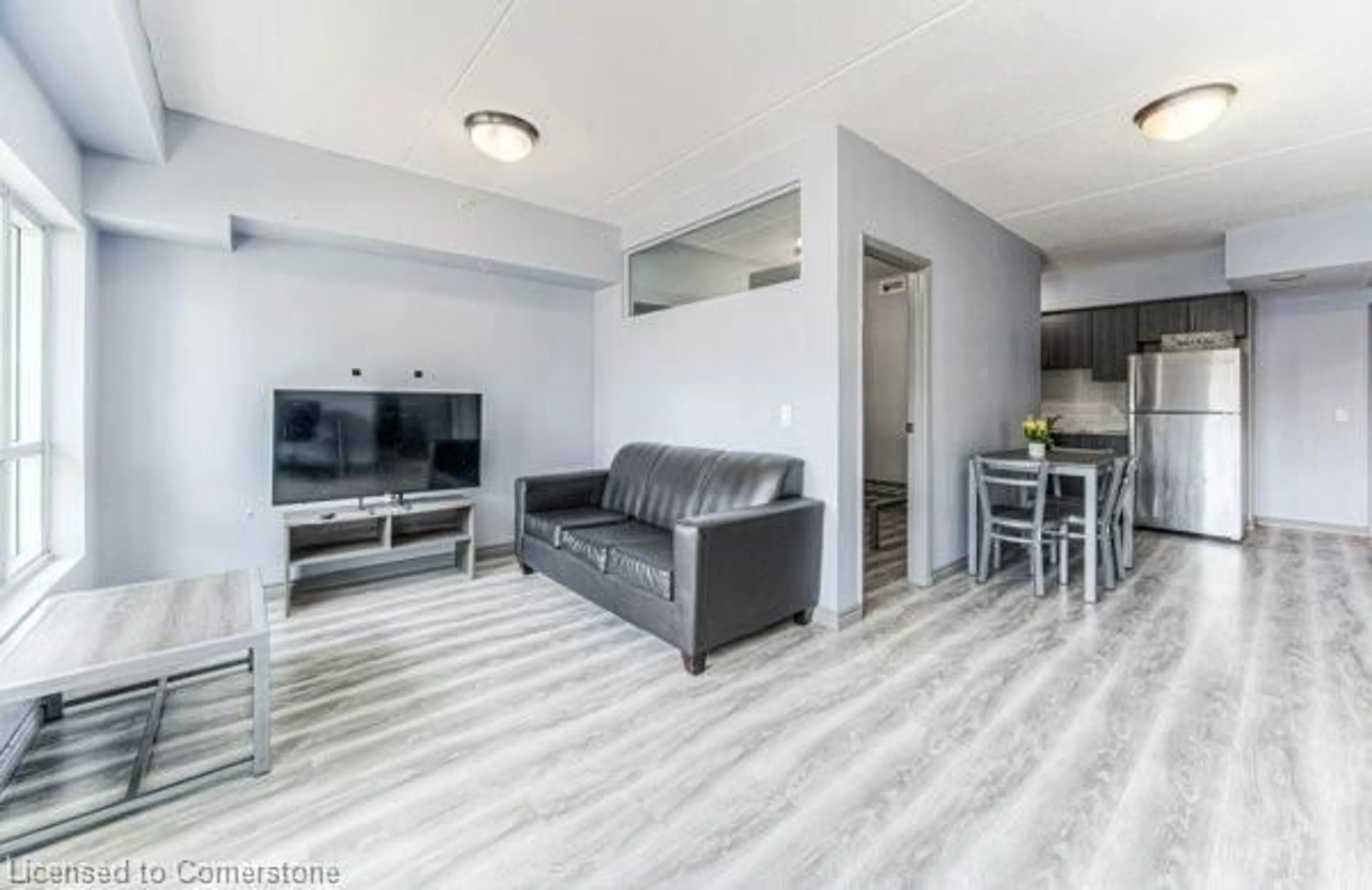 Living room with furniture, unknown for 275 Larch St #F311, Waterloo Ontario N2L 3R2