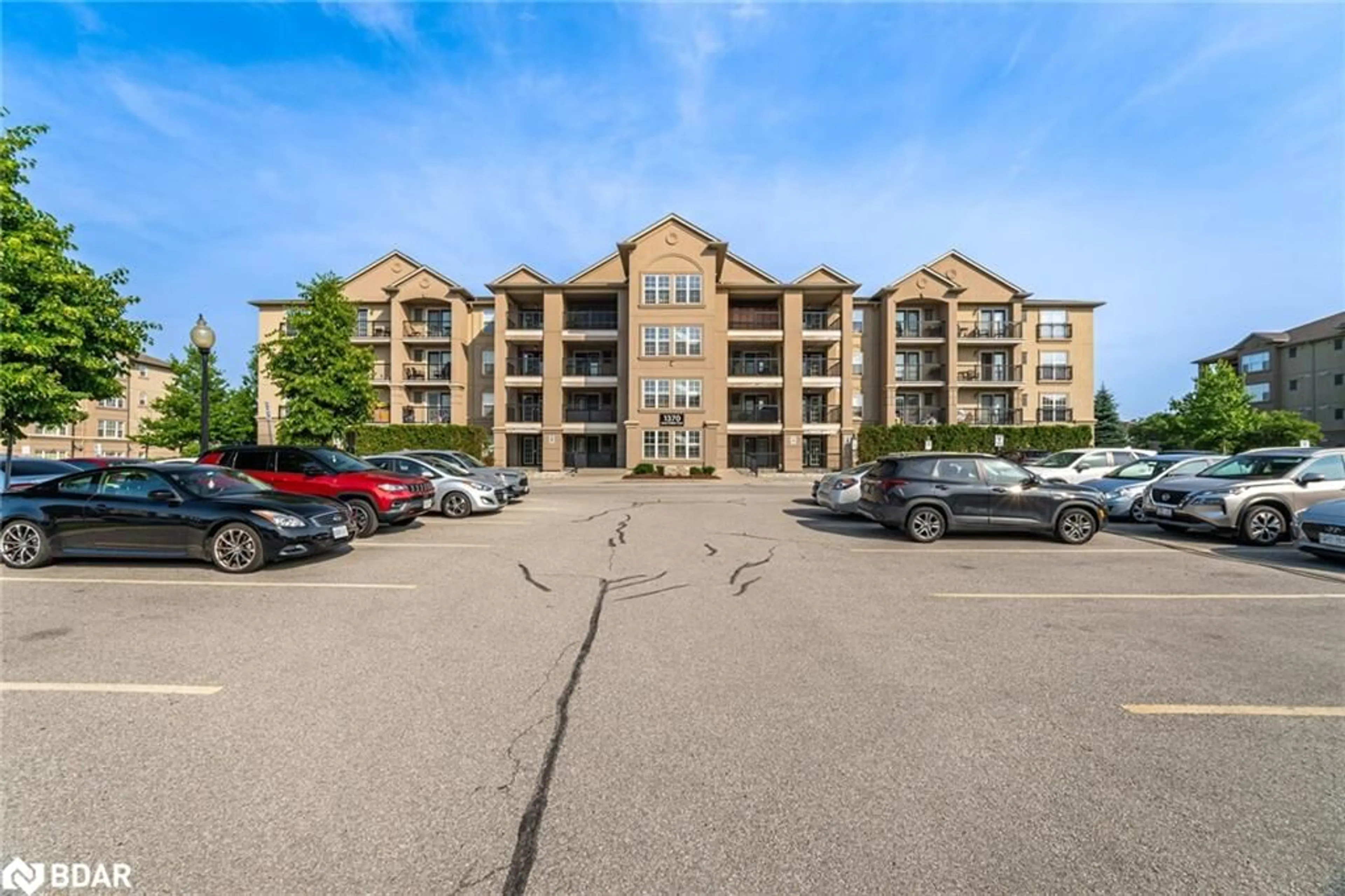 A pic from outside/outdoor area/front of a property/back of a property/a pic from drone, building for 1370 Main St #105, Milton Ontario L9T 7S8