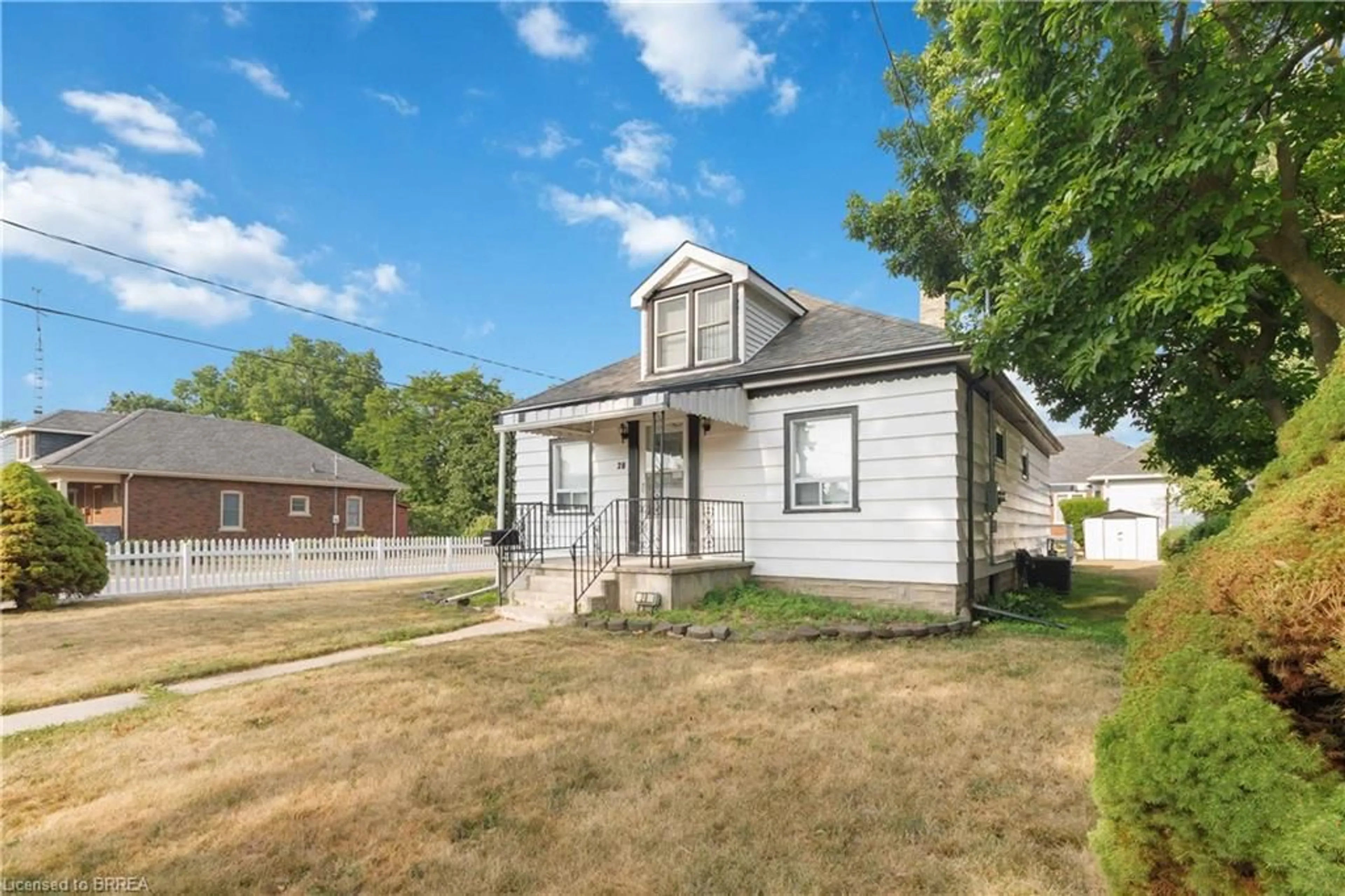 Home with vinyl exterior material, street for 28 Hamilton Ave, Brantford Ontario N3S 6Z8