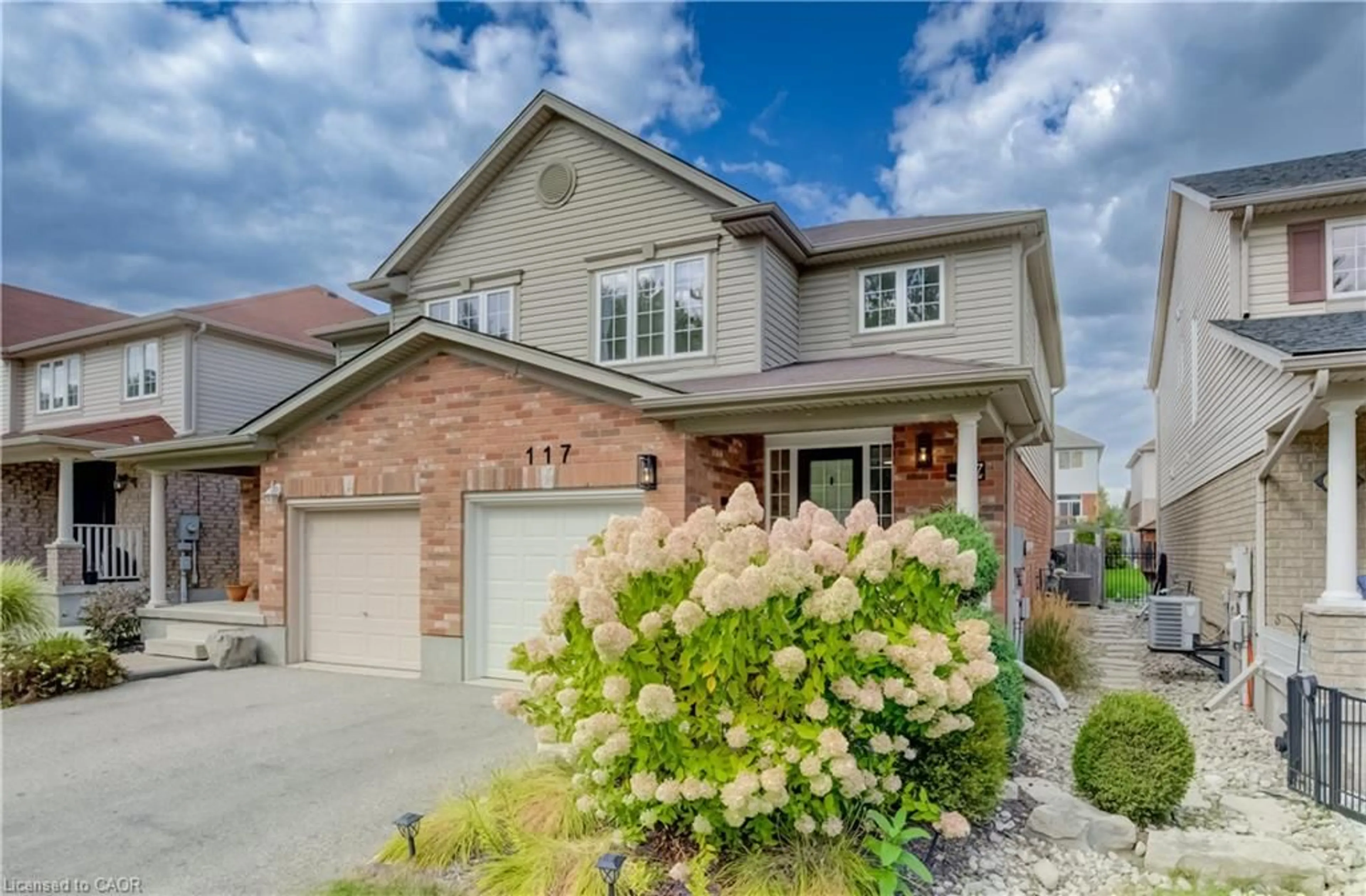 Home with brick exterior material, street for 117 Sims Estate Dr, Kitchener Ontario N2A 0A9
