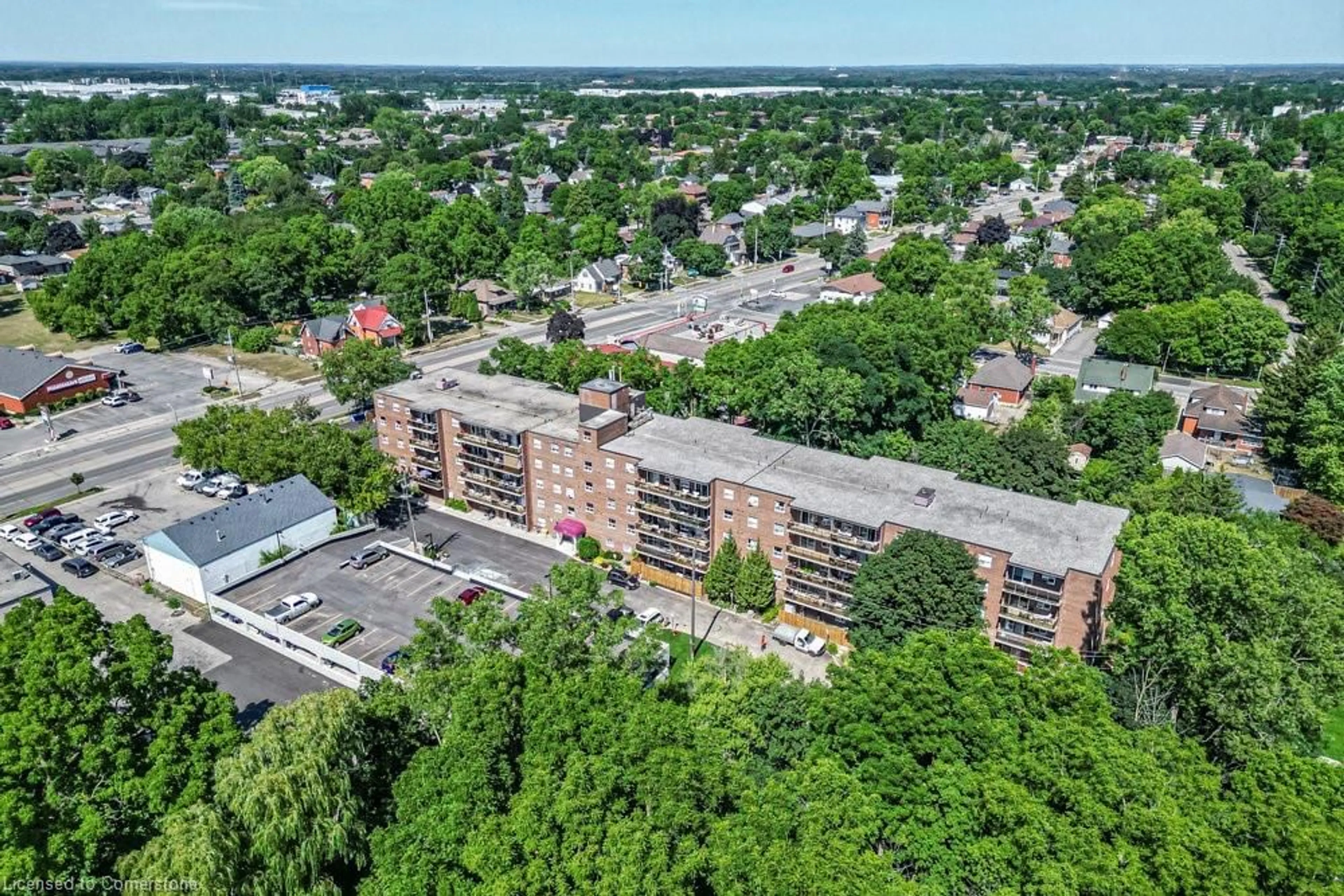 A pic from outside/outdoor area/front of a property/back of a property/a pic from drone, city buildings view from balcony for 793 Colborne St #107, Brantford Ontario N3S 7J3