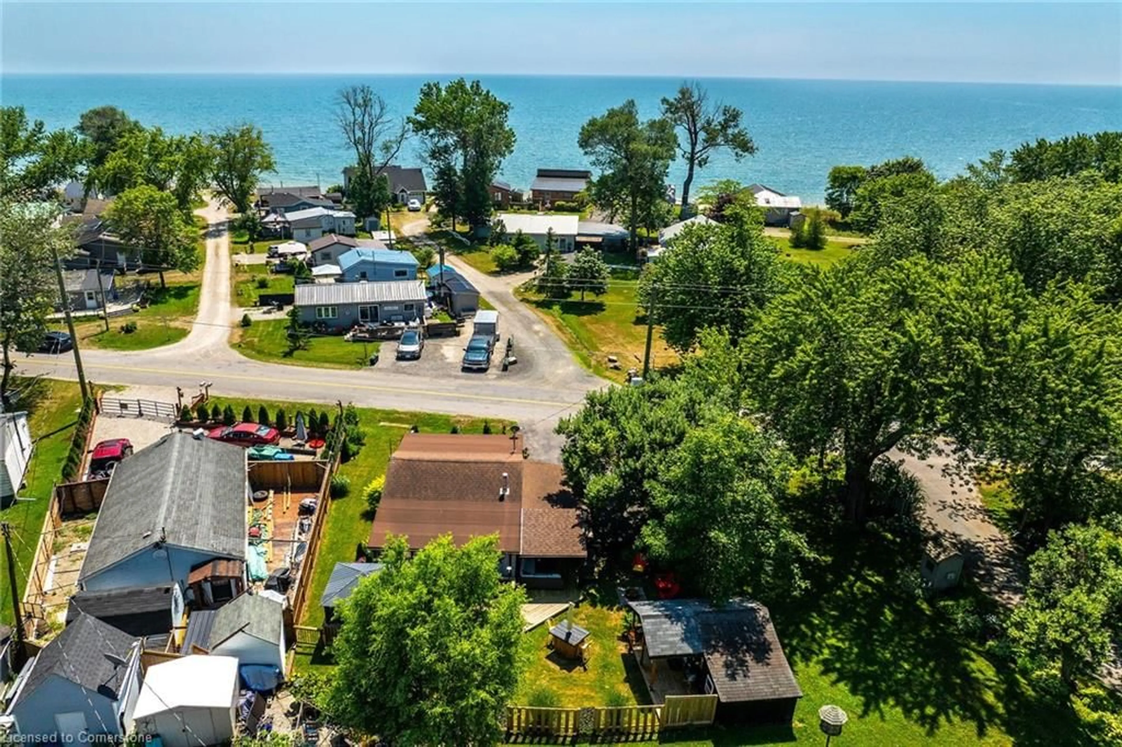 A pic from outside/outdoor area/front of a property/back of a property/a pic from drone, water/lake/river/ocean view for 1023 Lakeshore Rd, Selkirk Ontario N0A 1P0