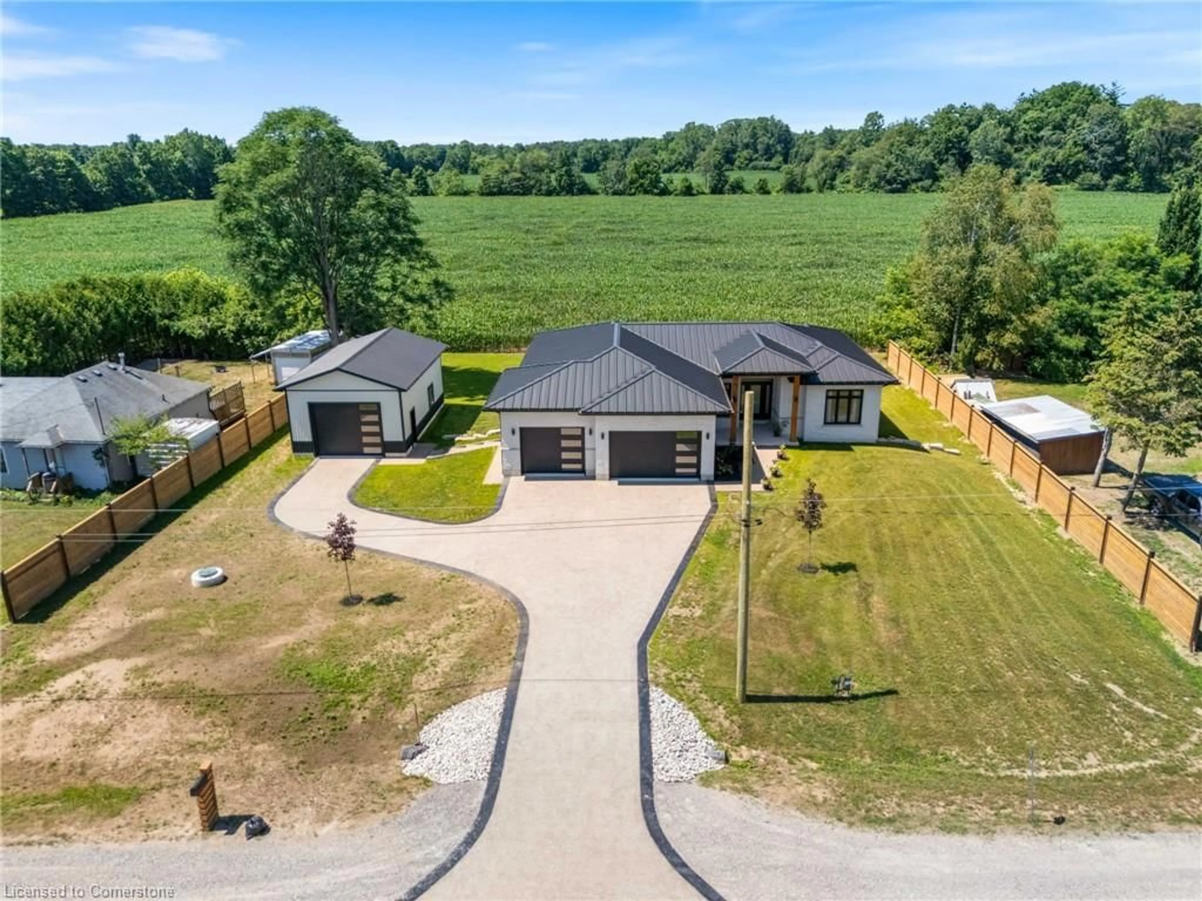 A pic from outside/outdoor area/front of a property/back of a property/a pic from drone, unknown for 3199 Highway 59, Langton Ontario N0E 1G0