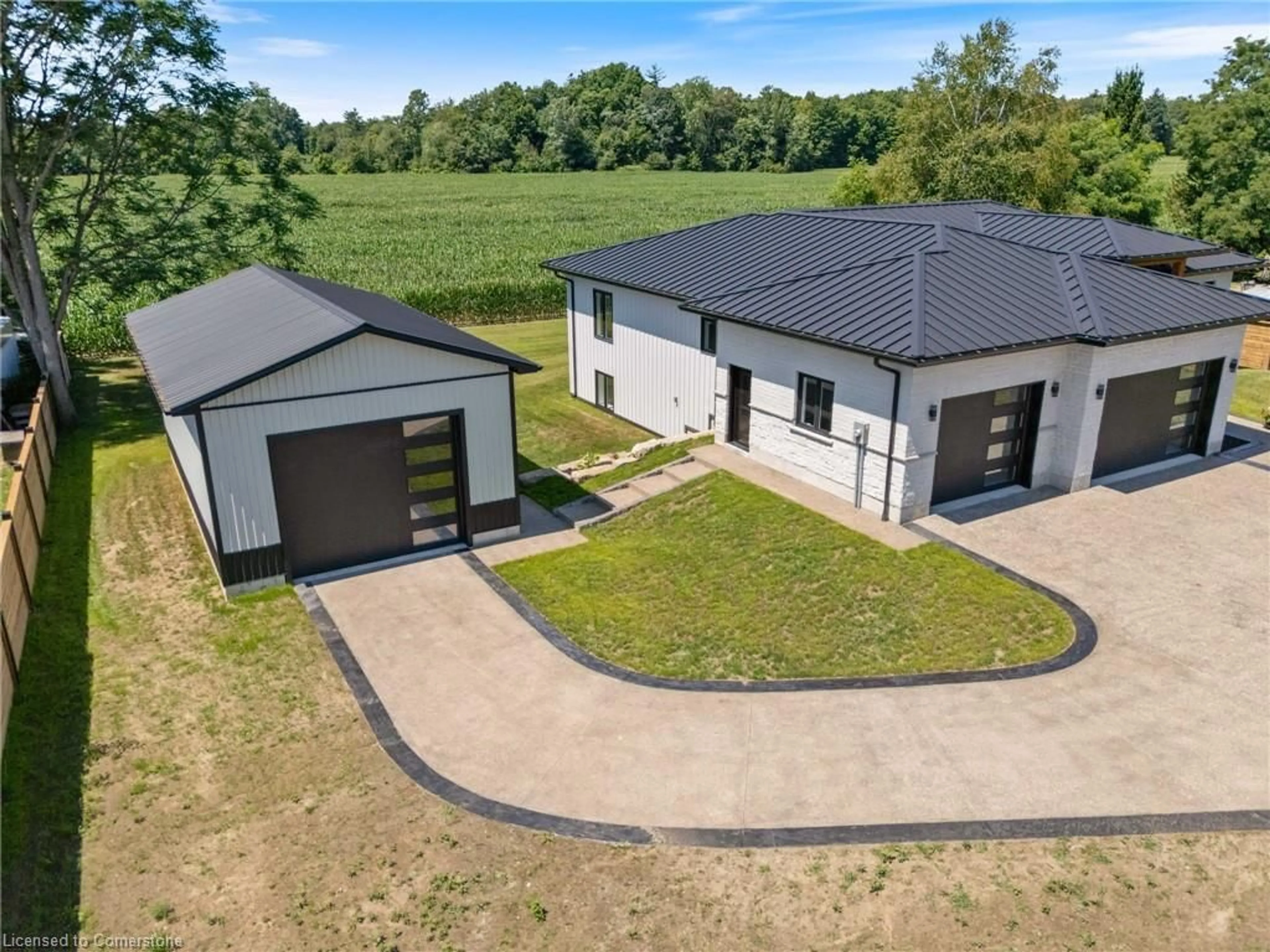 A pic from outside/outdoor area/front of a property/back of a property/a pic from drone, building for 3199 Highway 59, Langton Ontario N0E 1G0