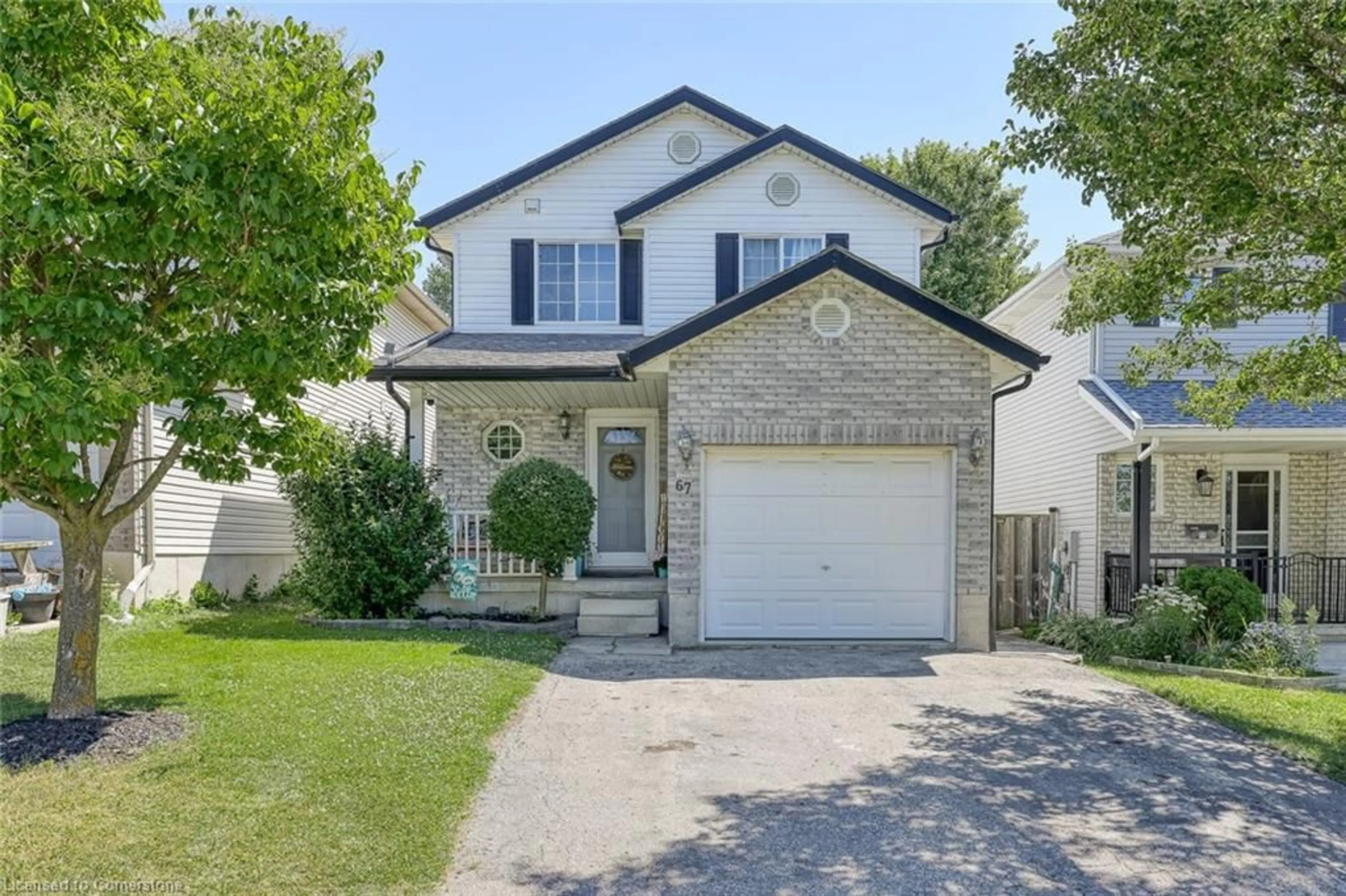 Home with vinyl exterior material, street for 67 Stafford St, Woodstock Ontario N4S 3Z8