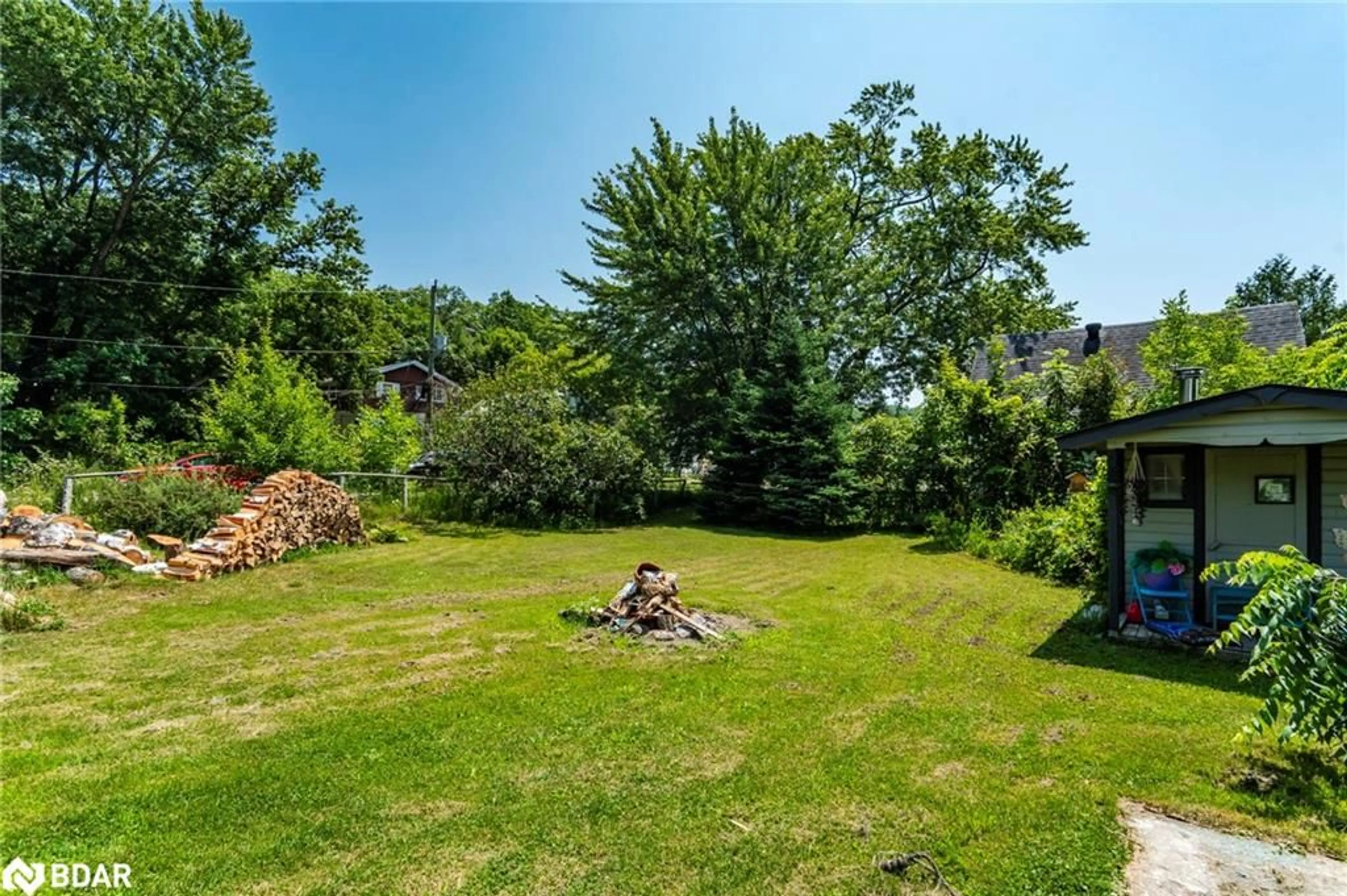 Patio, forest/trees view for 44 Yeo St, Penetanguishene Ontario L9M 1C9