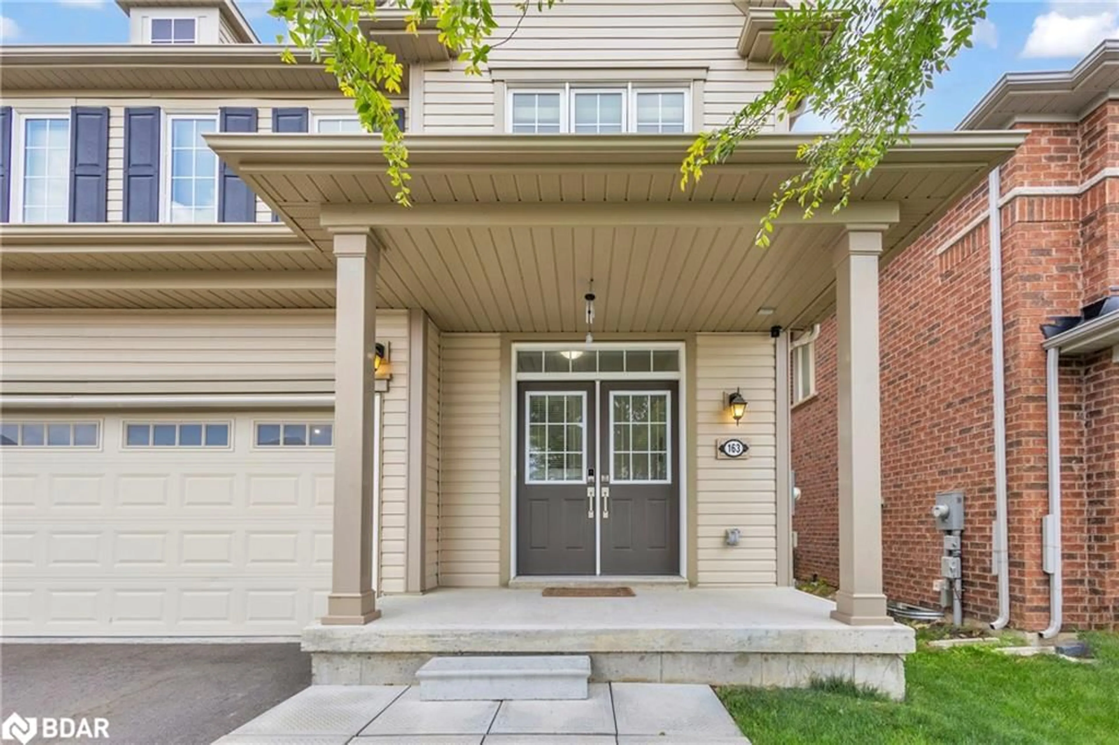 Home with brick exterior material, street for 163 Munro Circle Cir, Brantford Ontario N3T 0R3