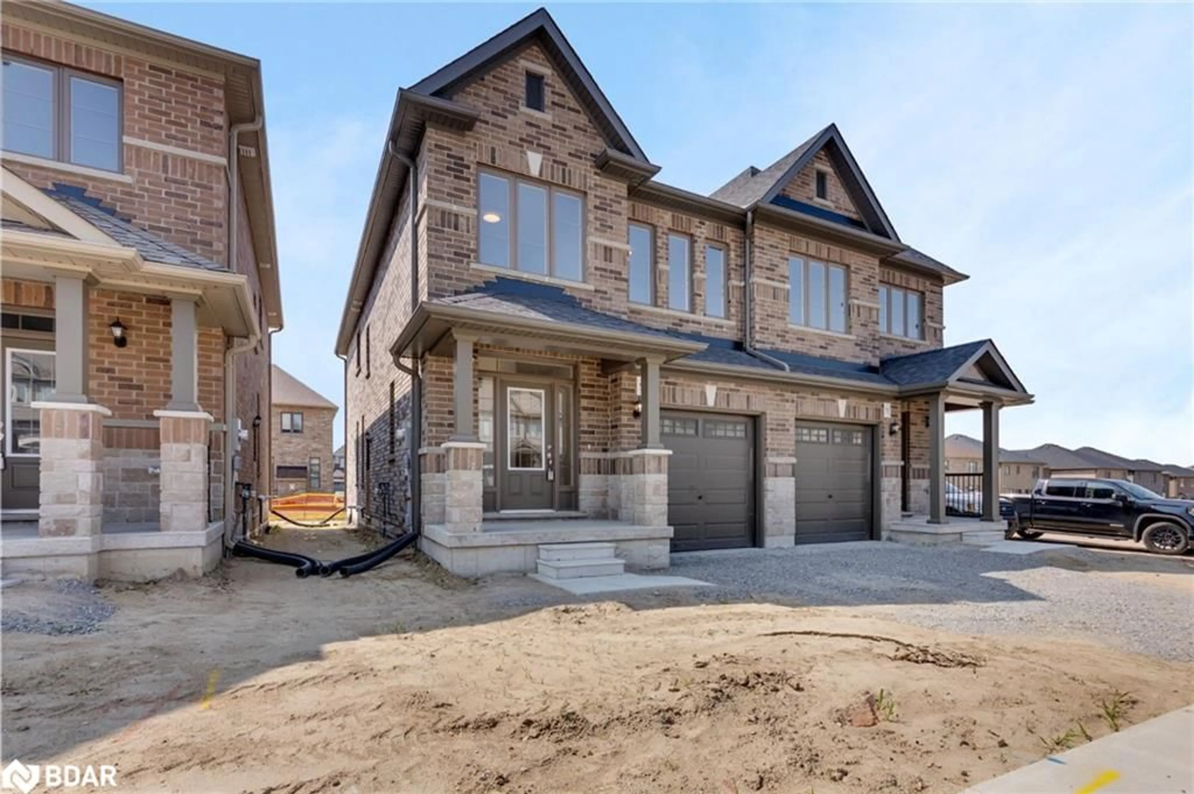 Home with brick exterior material, street for 54 Sagewood Ave, Barrie Ontario L9J 0K5