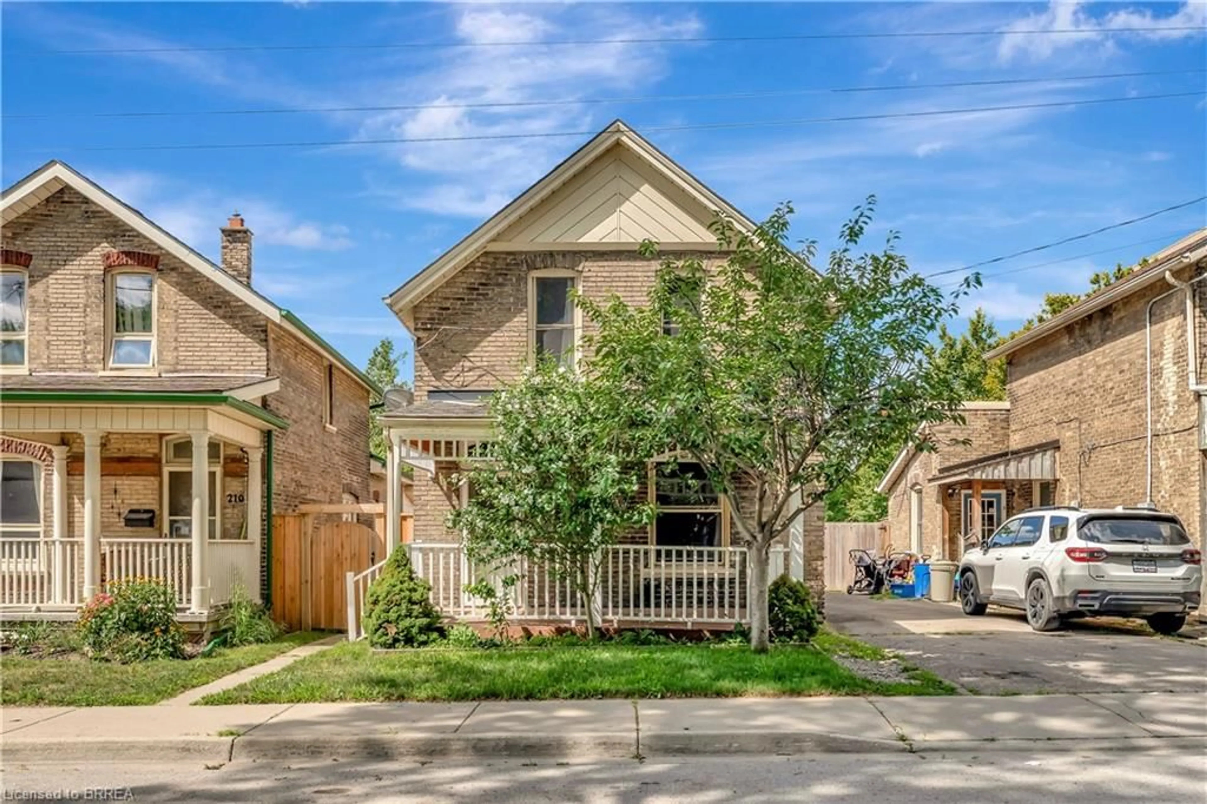 Home with brick exterior material, street for 212 William St, Brantford Ontario N3T 3L7