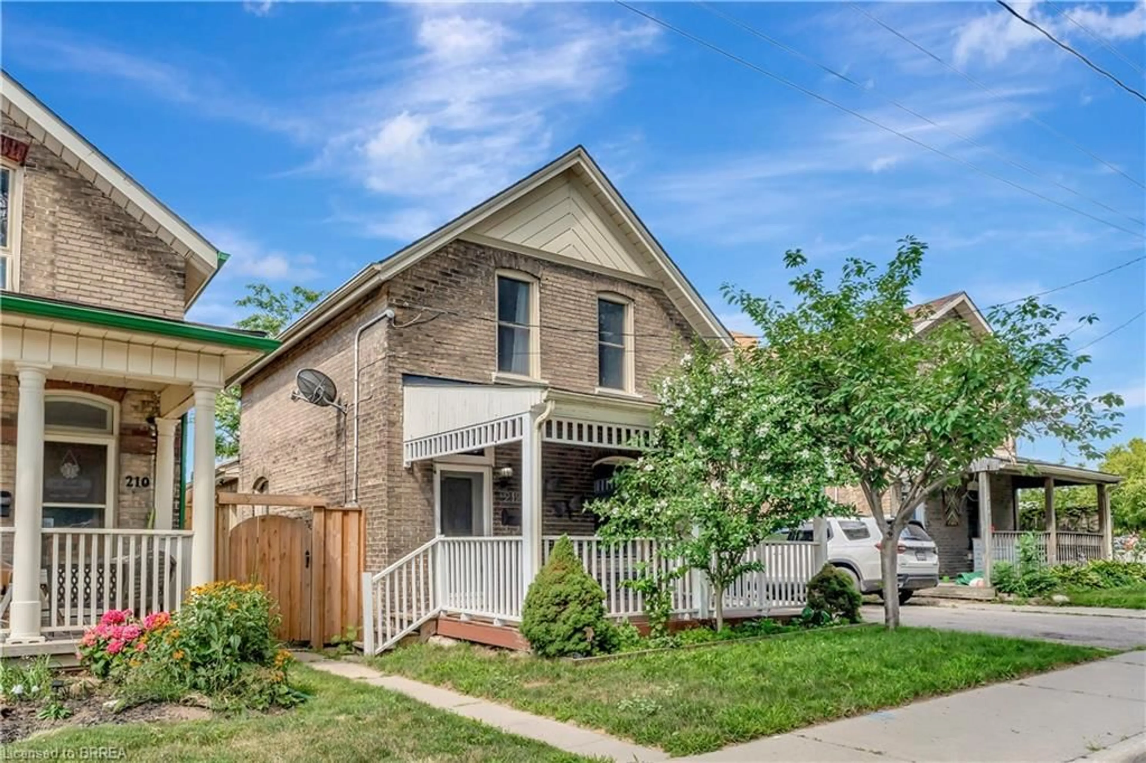 Home with brick exterior material, street for 212 William St, Brantford Ontario N3T 3L7