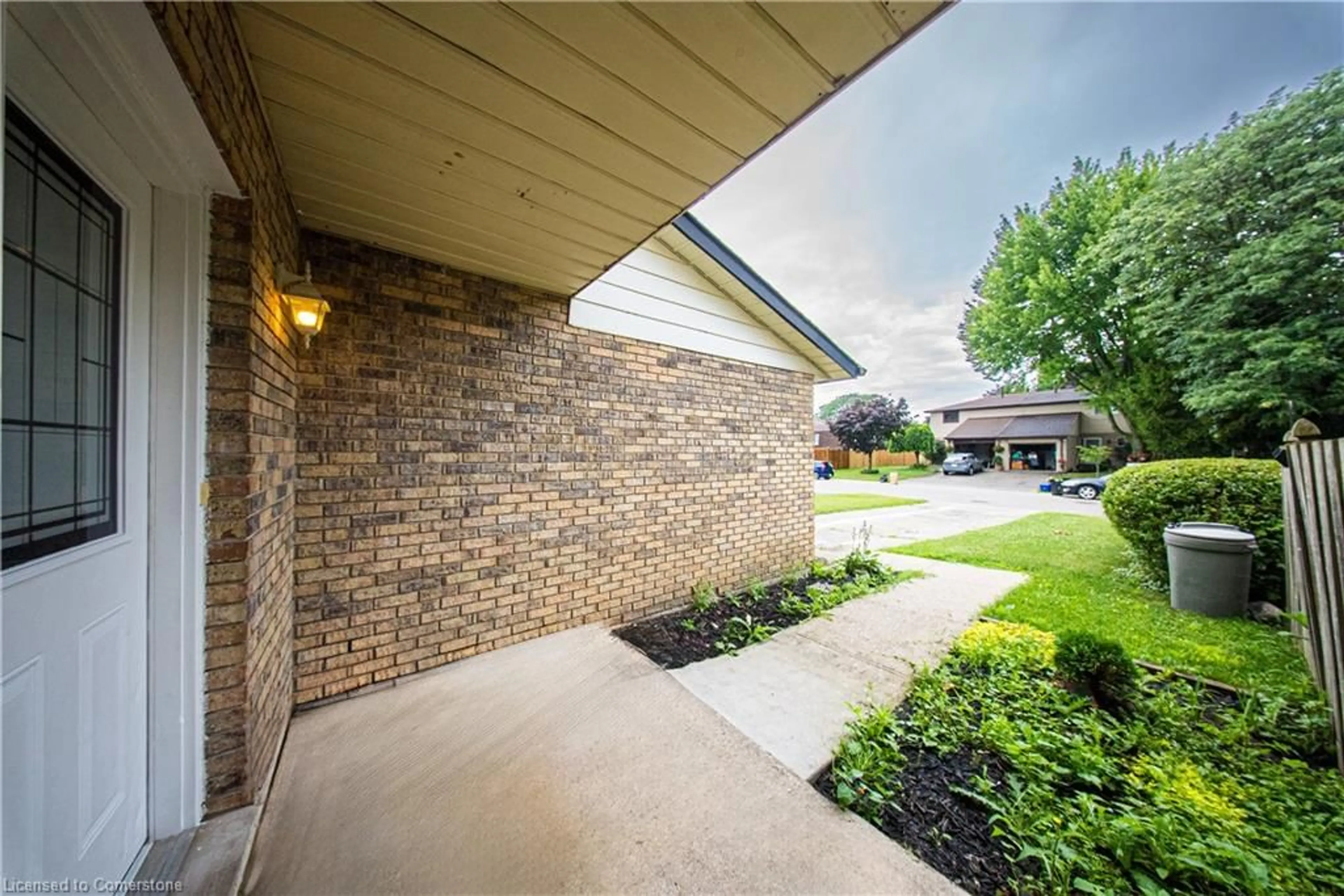 Home with brick exterior material, street for 8 Woods End, Brantford Ontario N3R 6M8