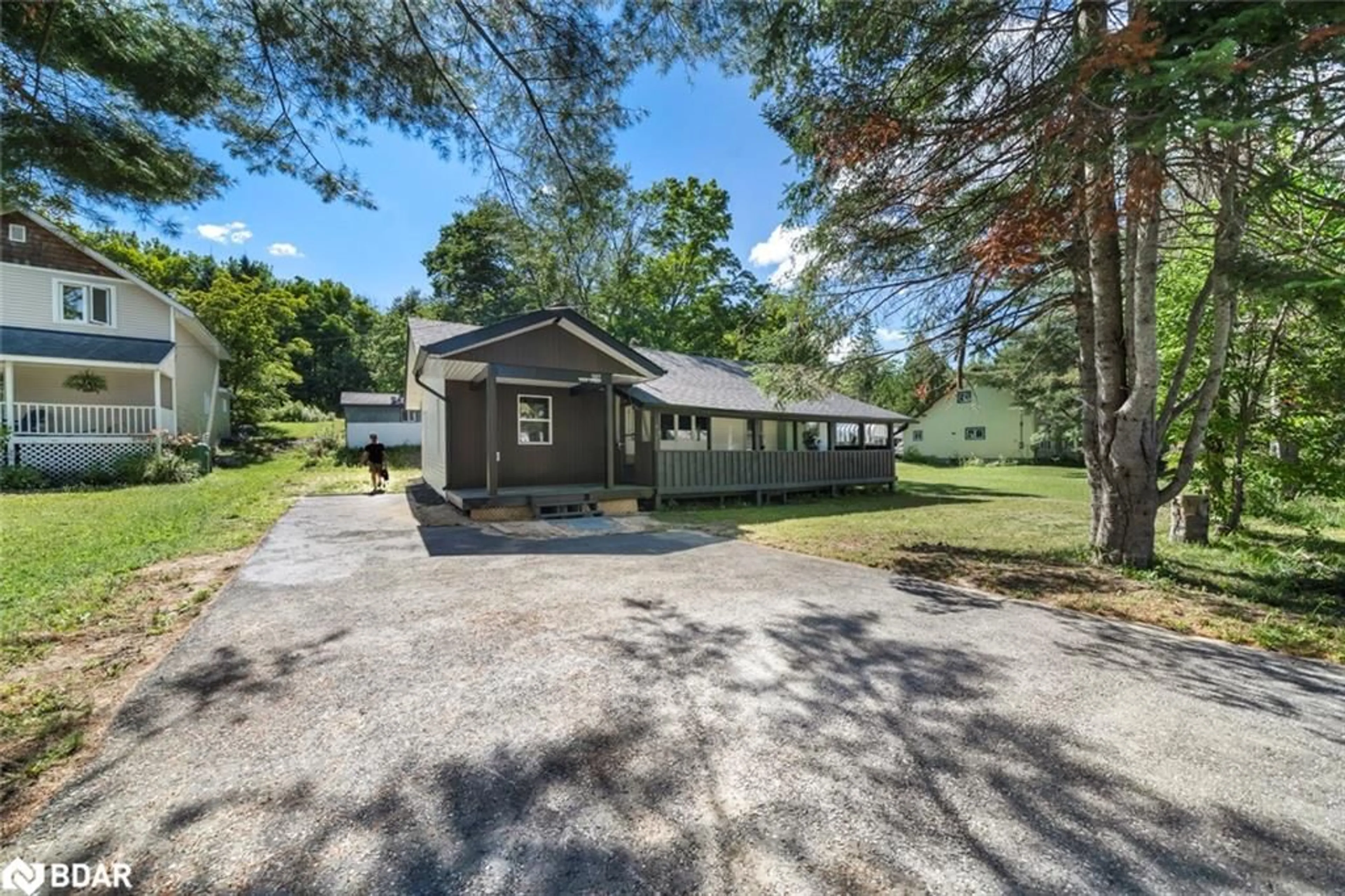 A pic from outside/outdoor area/front of a property/back of a property/a pic from drone, water/lake/river/ocean view for 597 High Street, MacTier Ontario P0C 1H0