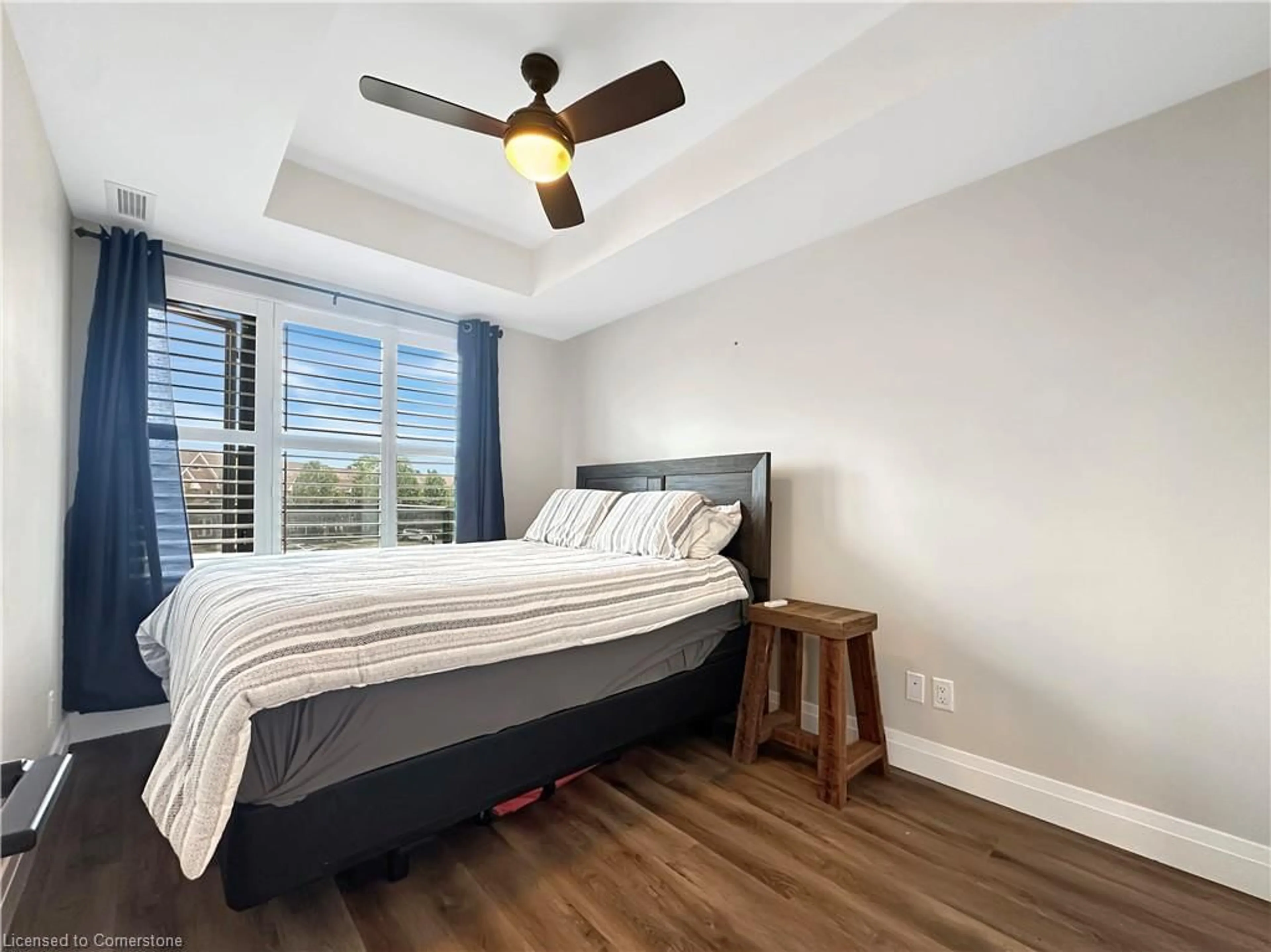 Bedroom with bed, wood/laminate floor for 64 Main St N #204, Hagersville Ontario N0A 1H0